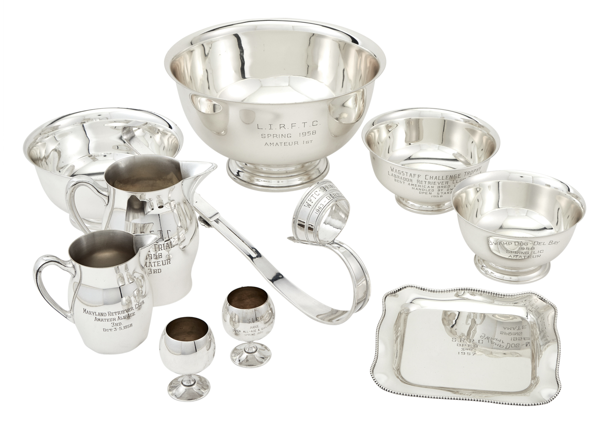 Lot image - Group of American Sterling Silver and Silver Plated Kennel Club Trophies