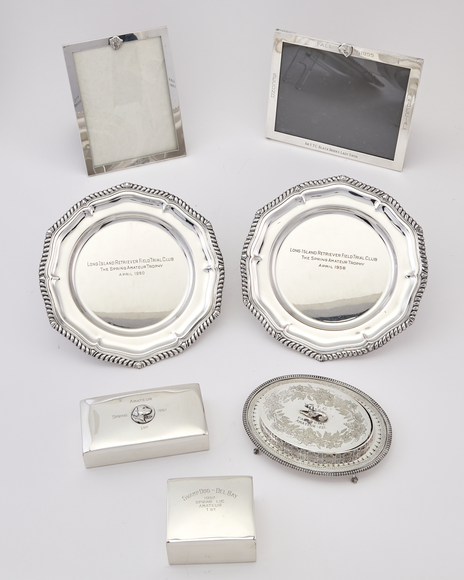 Lot image - Group of American Sterling Silver and Silver Plated Kennel Club Trophies