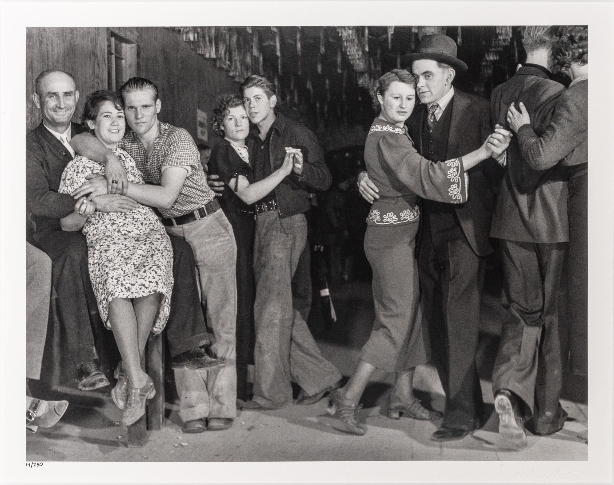 Lot image - BOURKE-WHITE, MARGARET (1904-1971)  Construction Workers and Taxi Dancers, Fort Peck, Montana,