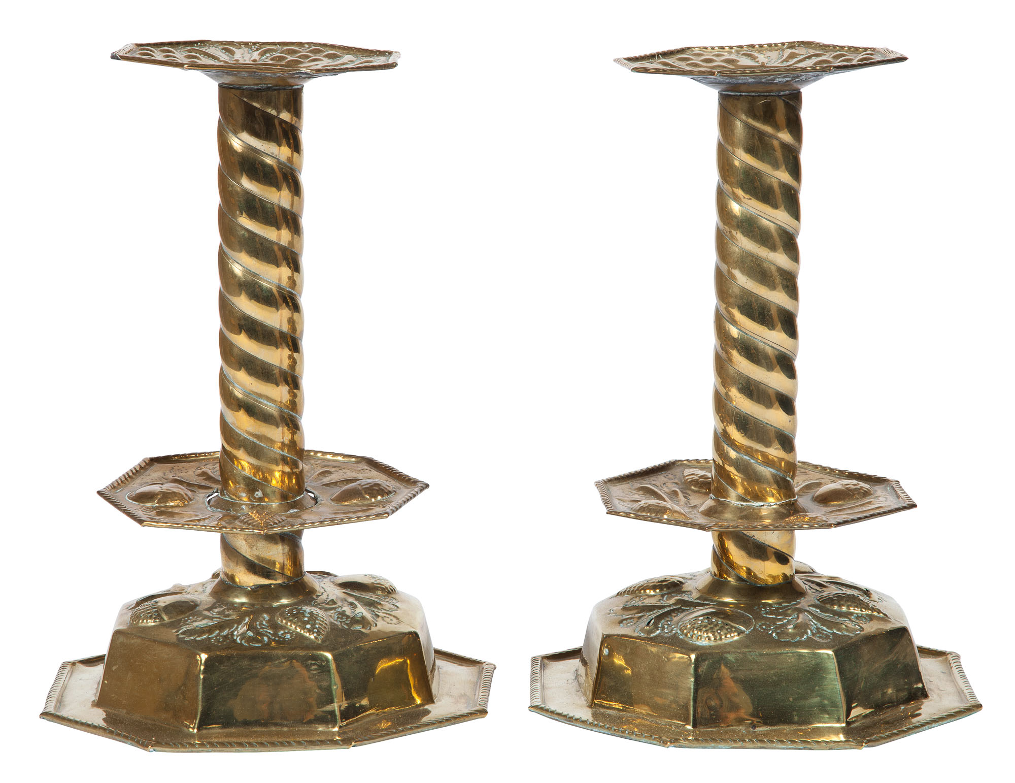 Lot image - Pair of English Brass Repoussé-Decorated Spiral Twist Candlesticks