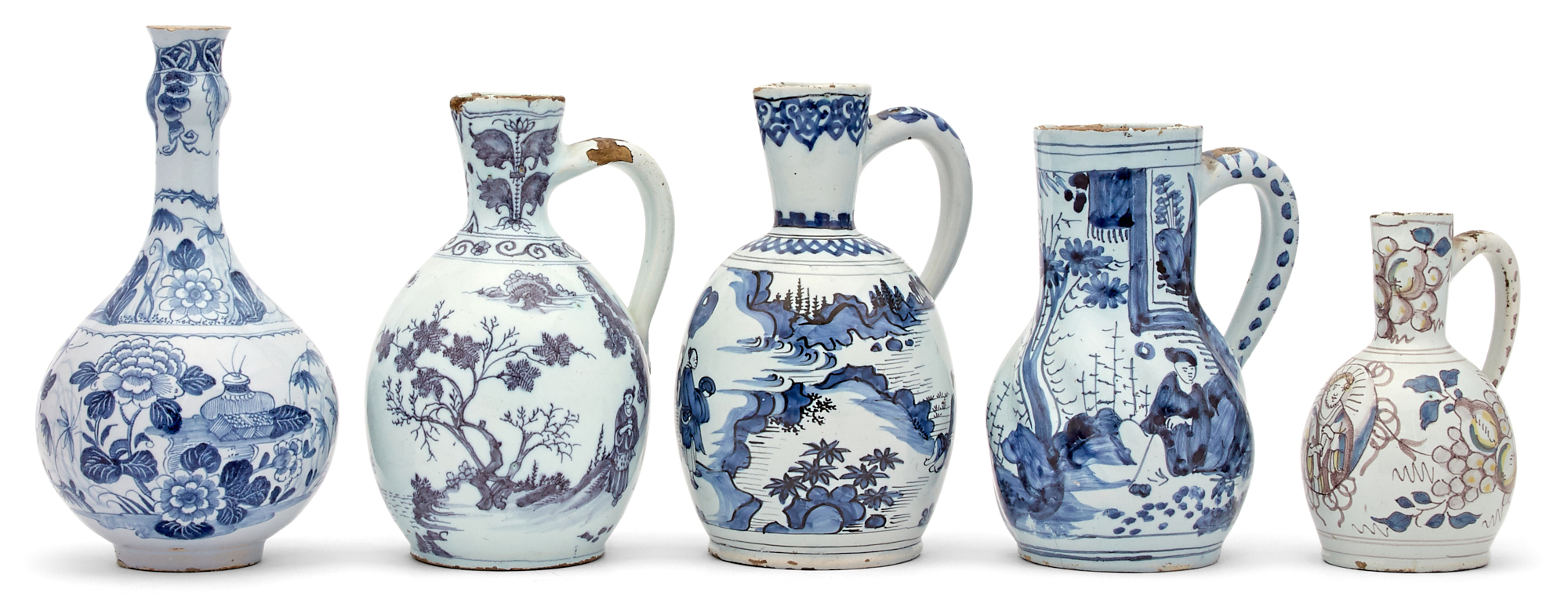 Lot image - Four Delft Jugs; Together with a Guglet Jug