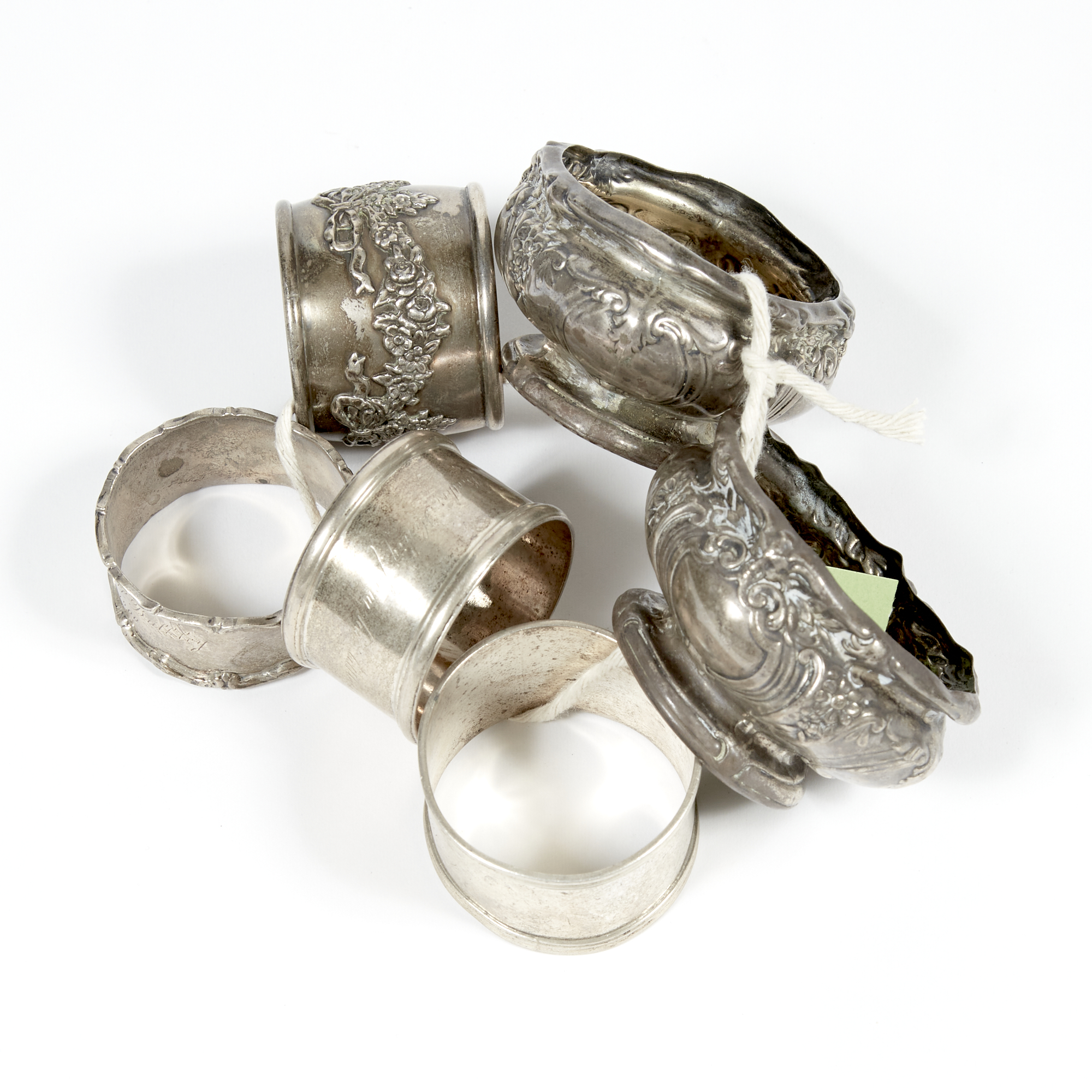 Lot image - 4 Silver Napkin Holders and 2 Candle Holders, 7 ozs., damaged