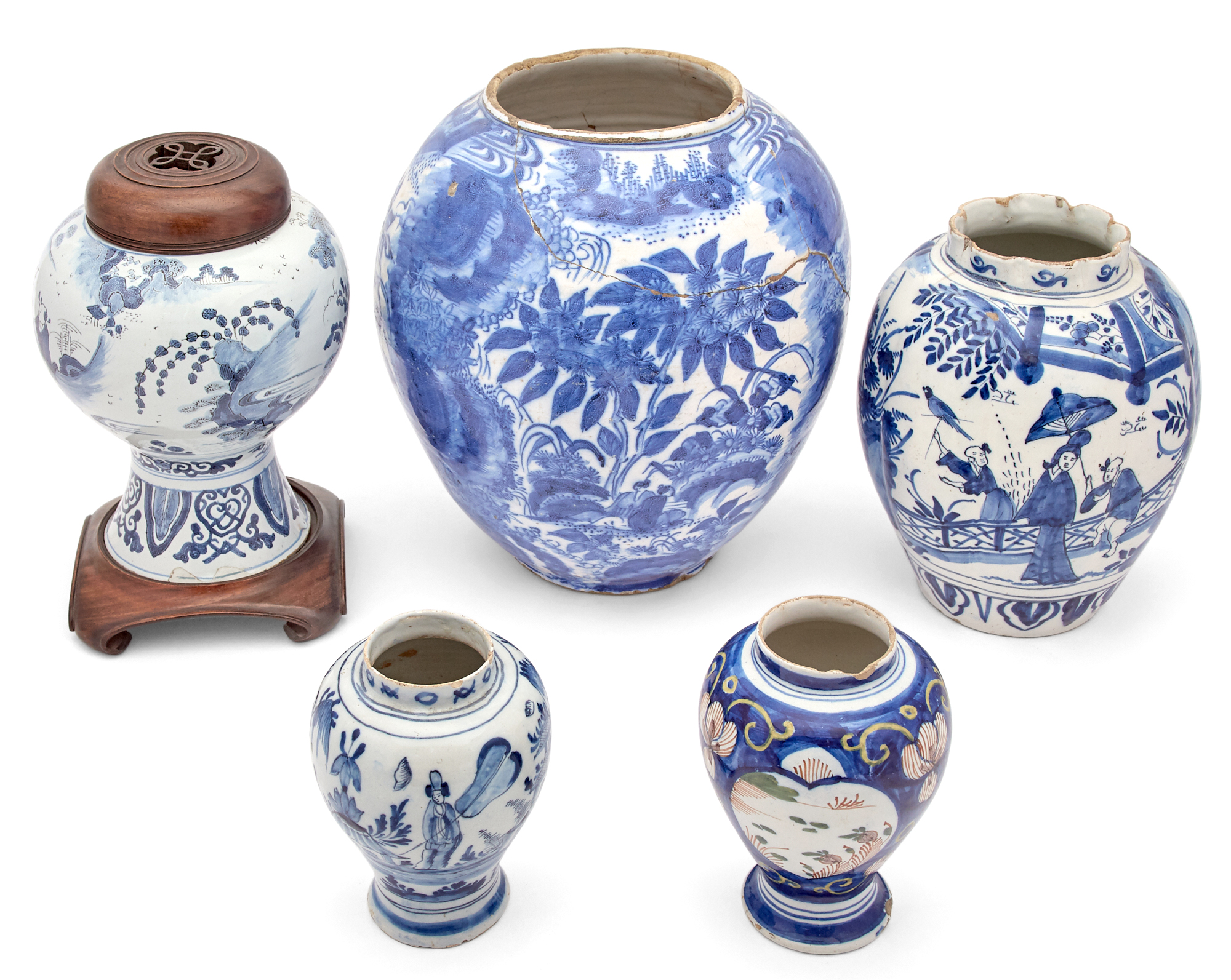 Lot image - Four Delft Blue and White Jars; Together with a Delft Polychrome Jar