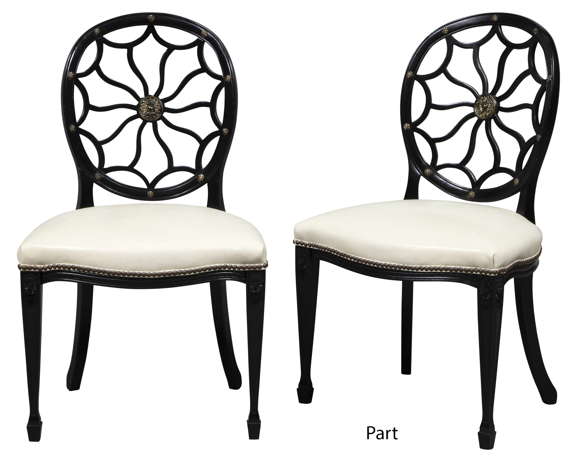 Lot image - Set of Eight George III Style Black Painted and Parcel-Gilt Wheelback Dining Chairs
