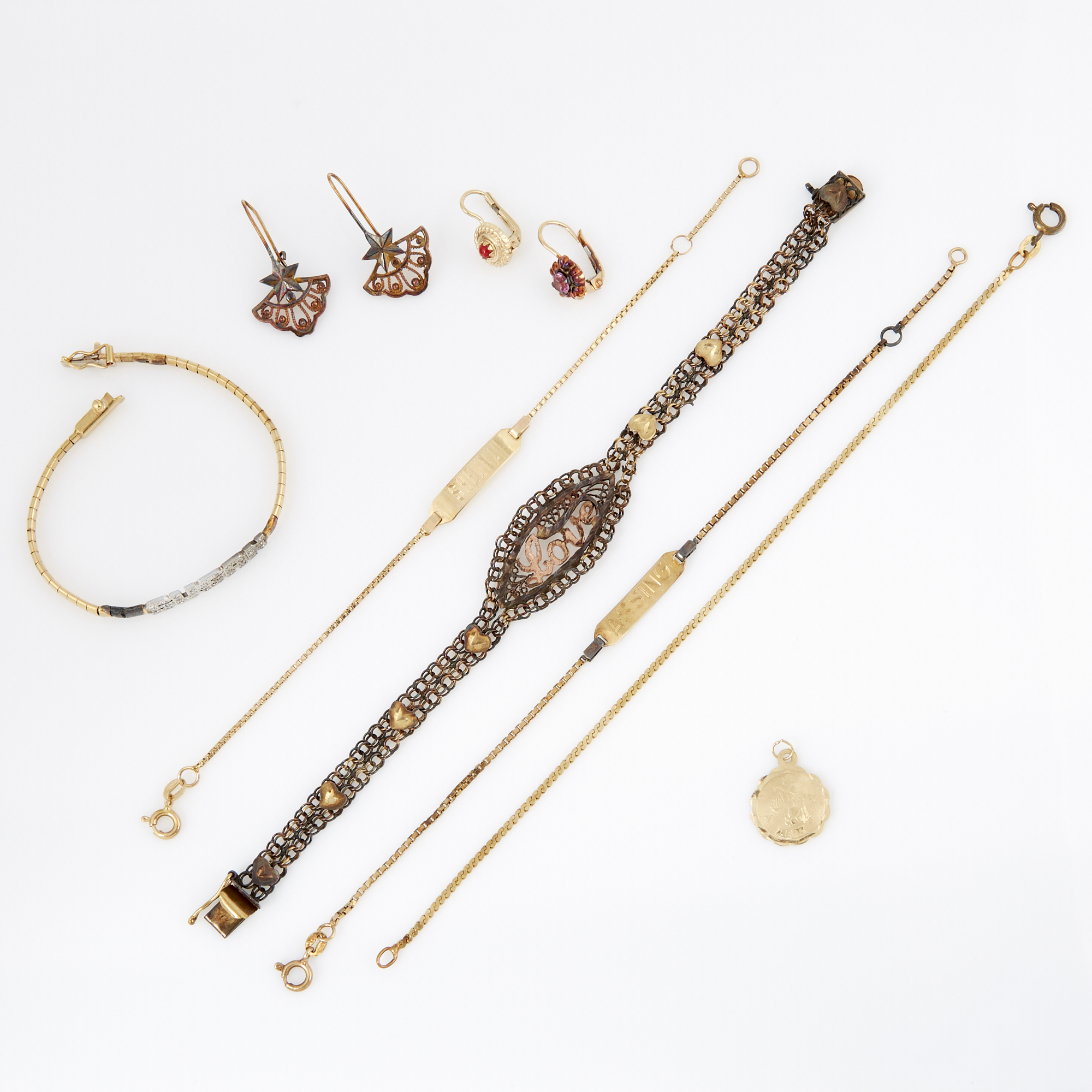 Lot image - Four Gold and Stone Earrings, Five Flexible Bracelets and Charm, 14K and 10K 17 dwt. all, damaged