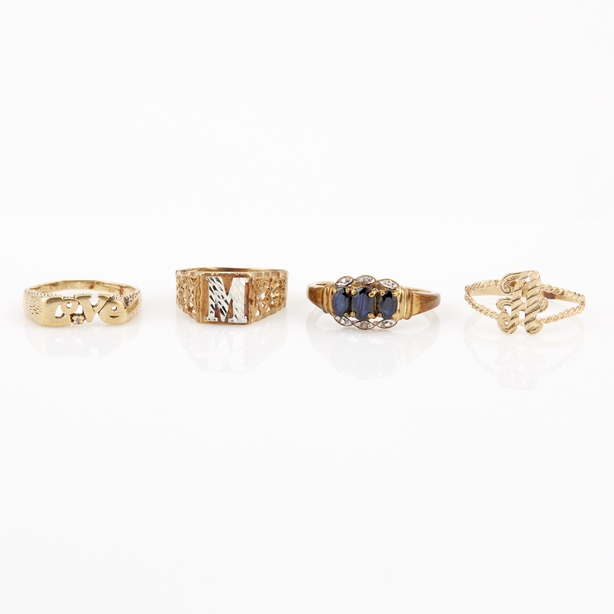 Lot image - Four Gold and Stone Rings, 14K 3 dwt. and 10K 3 dwt. all