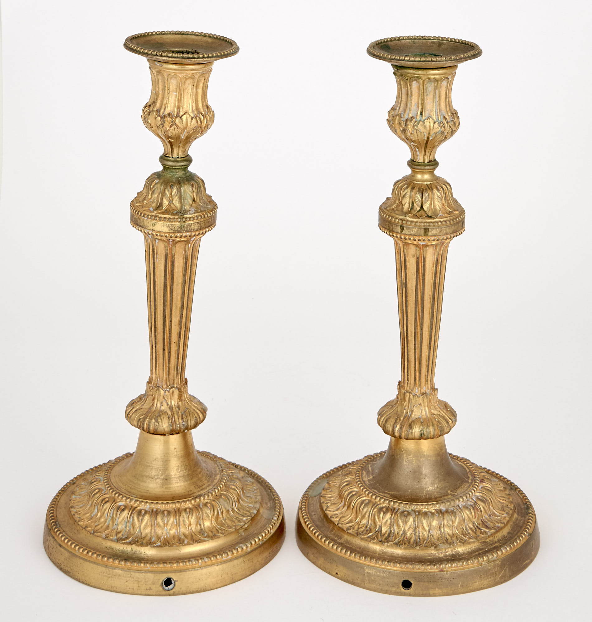 Lot image - Pair of Louis XVI Gilt Bronze Candlesticks