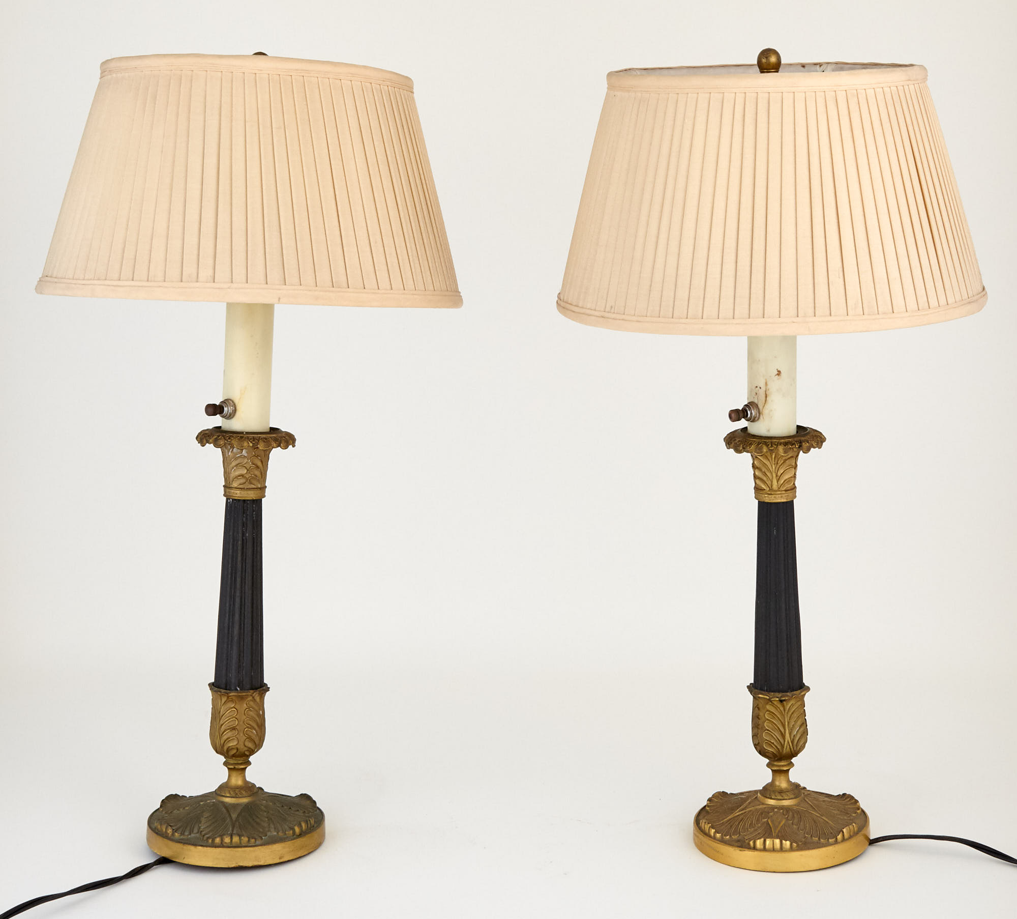 Lot image - Pair of Louis XVI Gilt and Patinated Bronze Candlestick Lamps