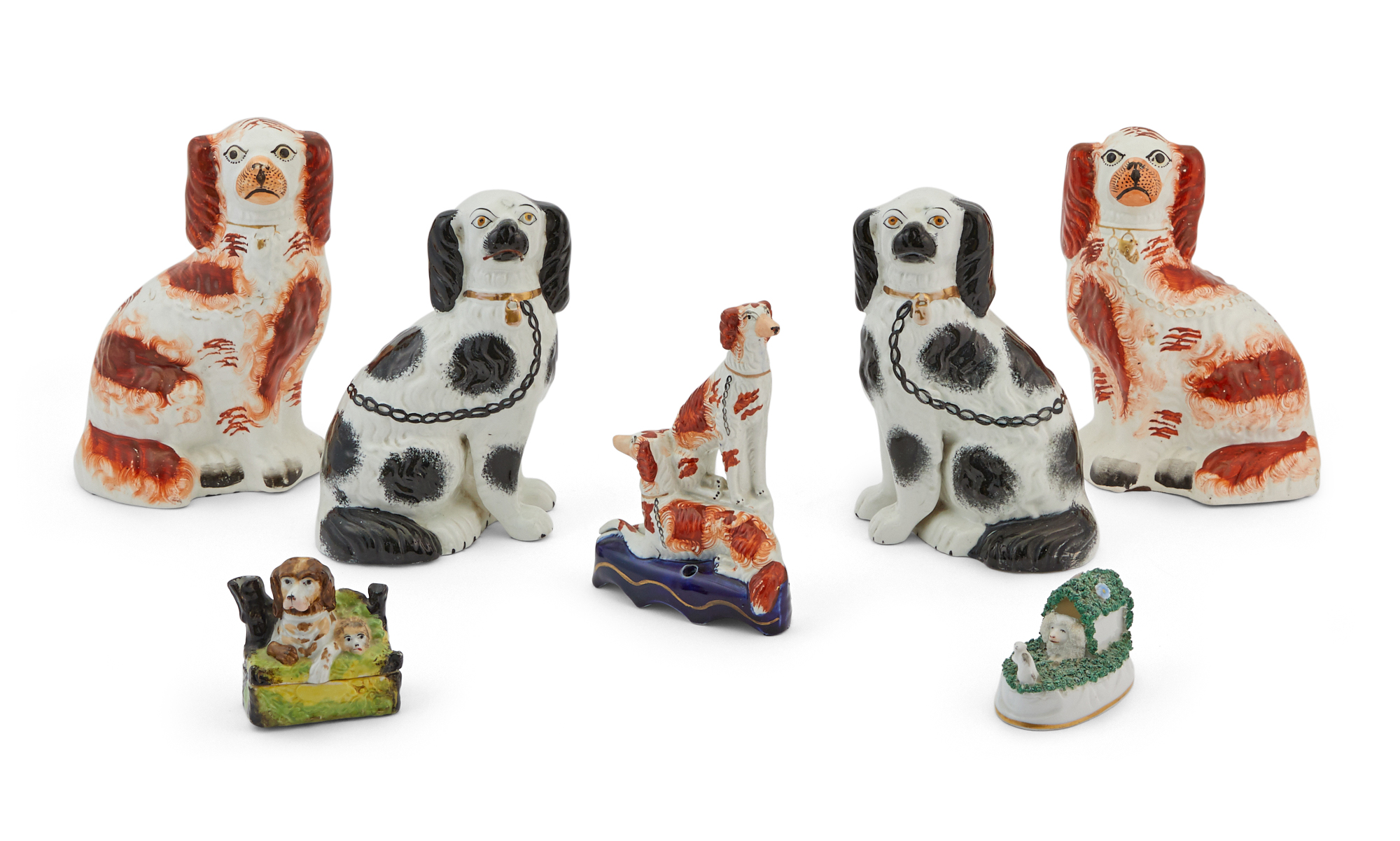 Lot image - Two Pairs of Staffordshire Pottery Spaniels