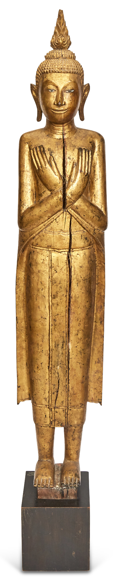 Lot image - A Thai Carved Giltwood Figure of Standing Buddha
