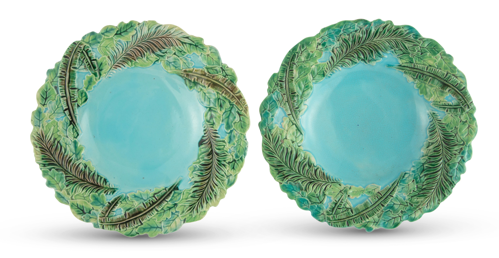 Lot image - Two George Jones Majolica Turquoise-Ground Fern and Palm Leaf Dessert Plates