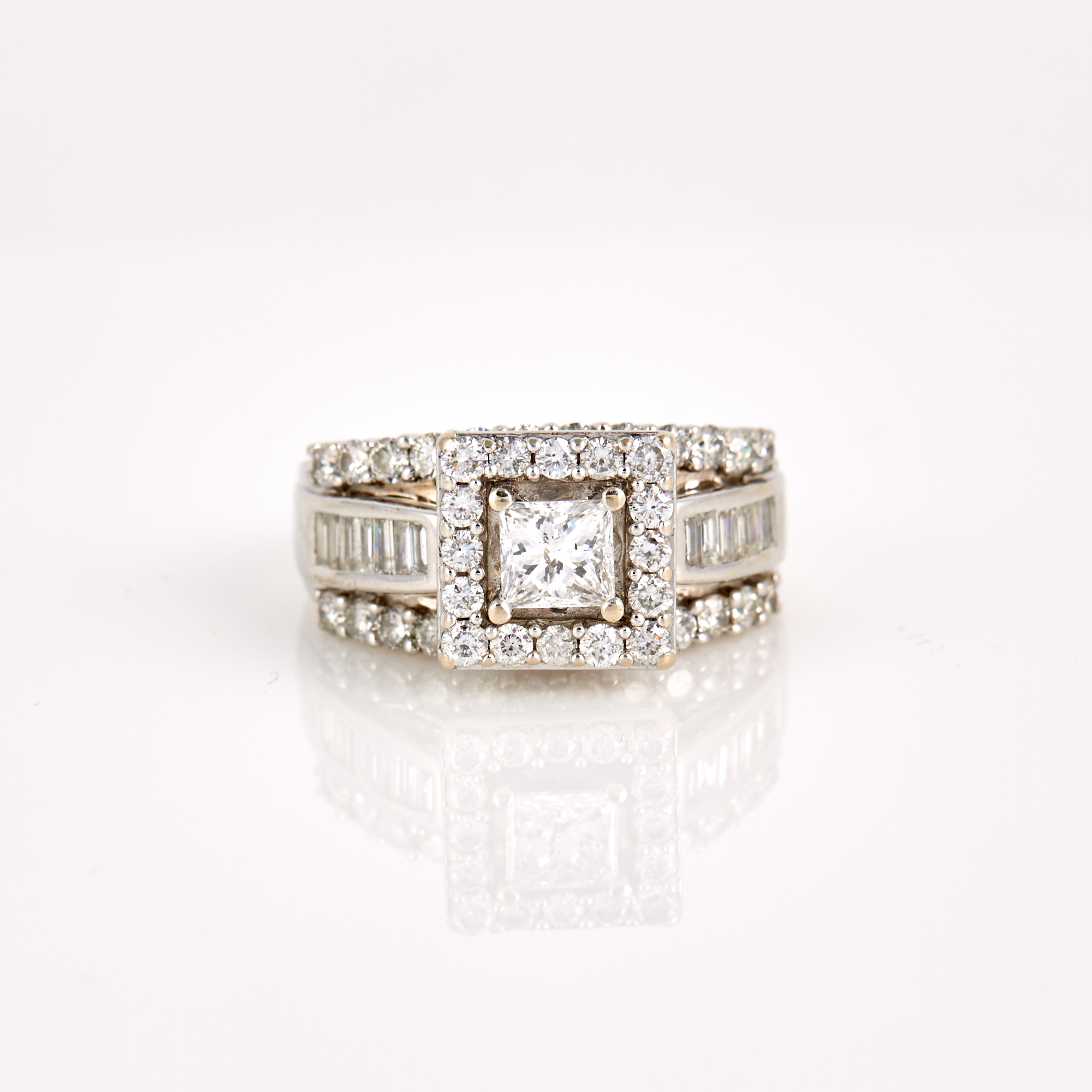 Lot image - Diamond Ring, 55 diamonds, center stone about 0.55 ct., 54 stones about 1.50 cts., 14K 5 dwt.,      clarity enhanced