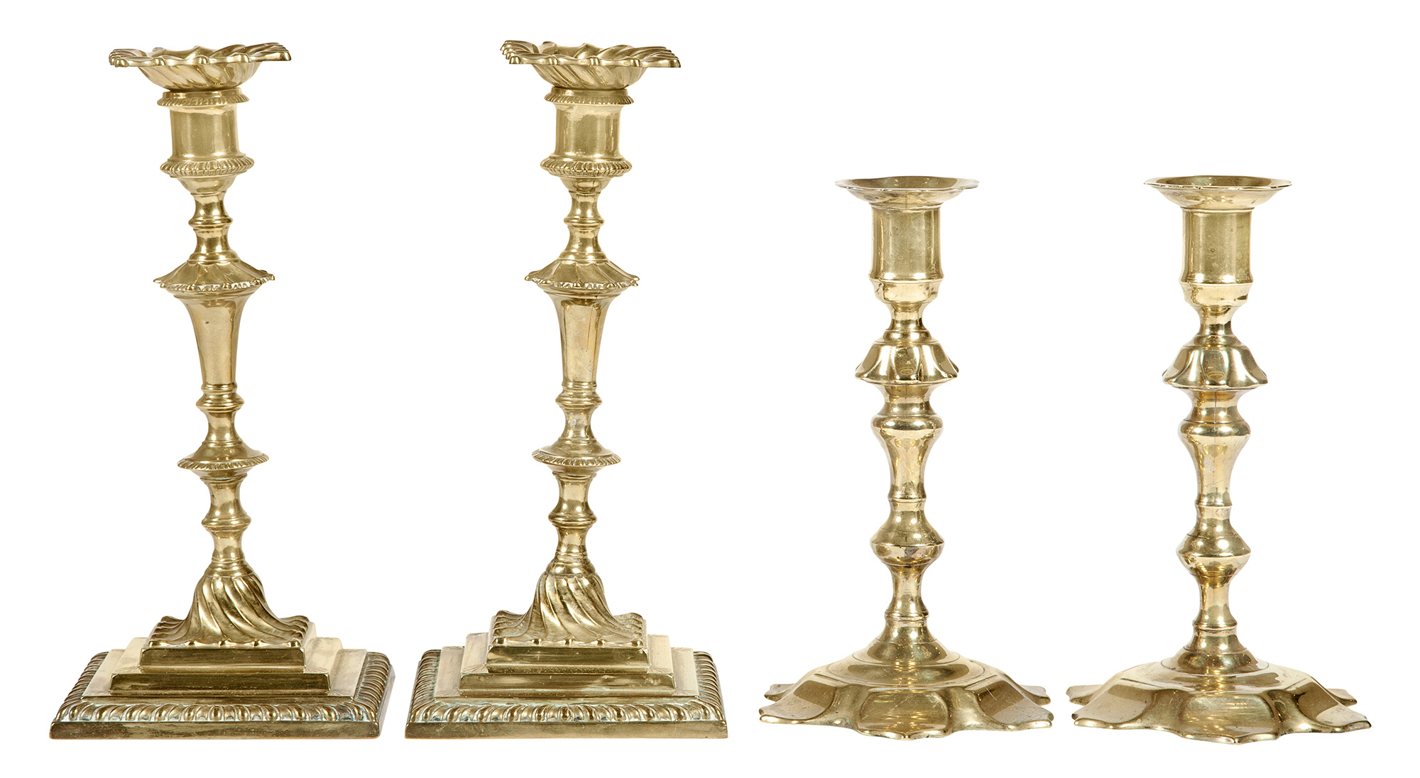 Lot image - Pair of George III Brass Candlesticks