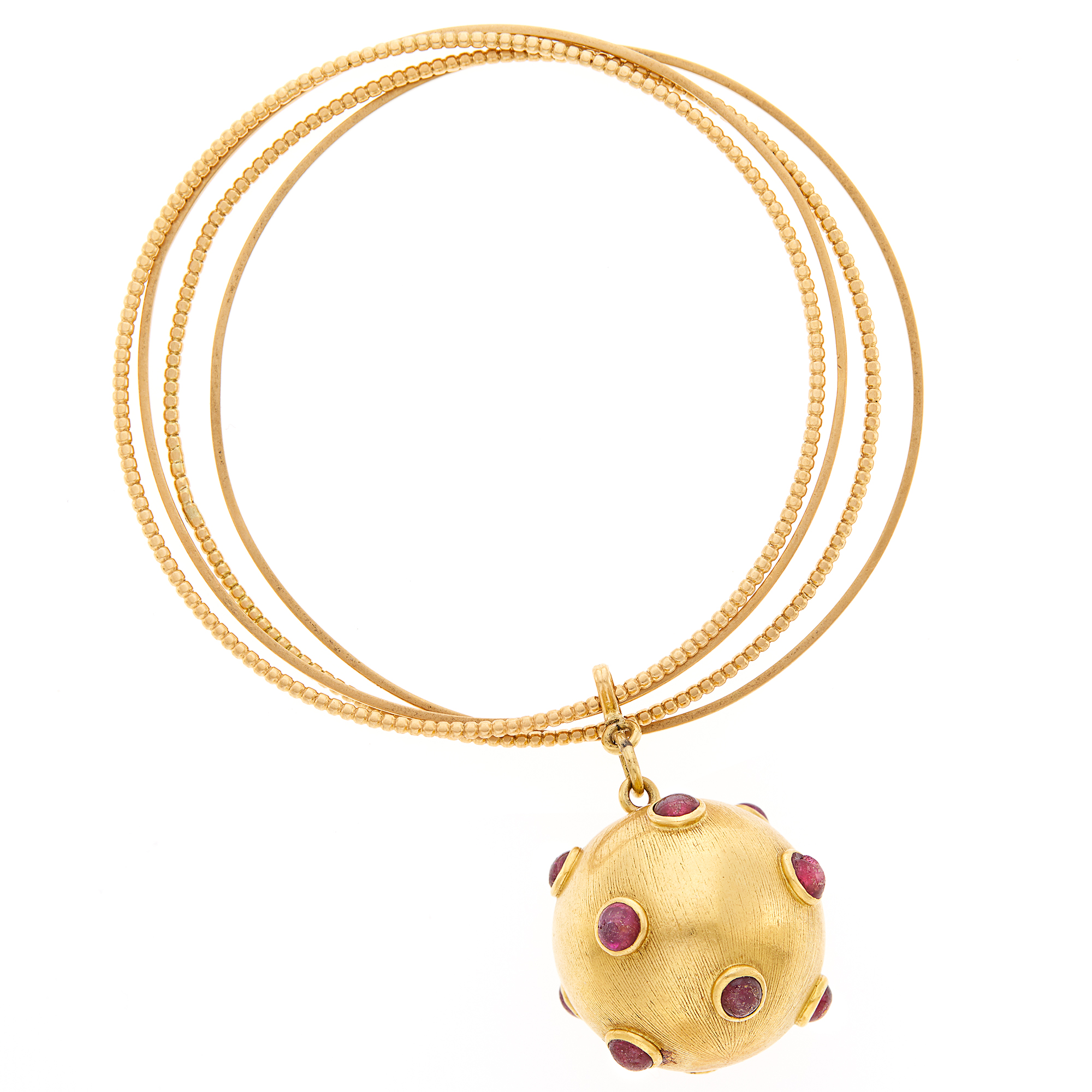 Lot image - Four Gold Bangle Bracelets with Gold and Cabochon Ruby Ball Charm