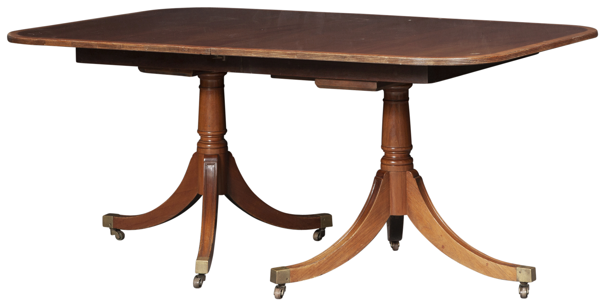 Lot image - George III Style Mahogany and Satinwood Double-Pedestal Extension Dining Table