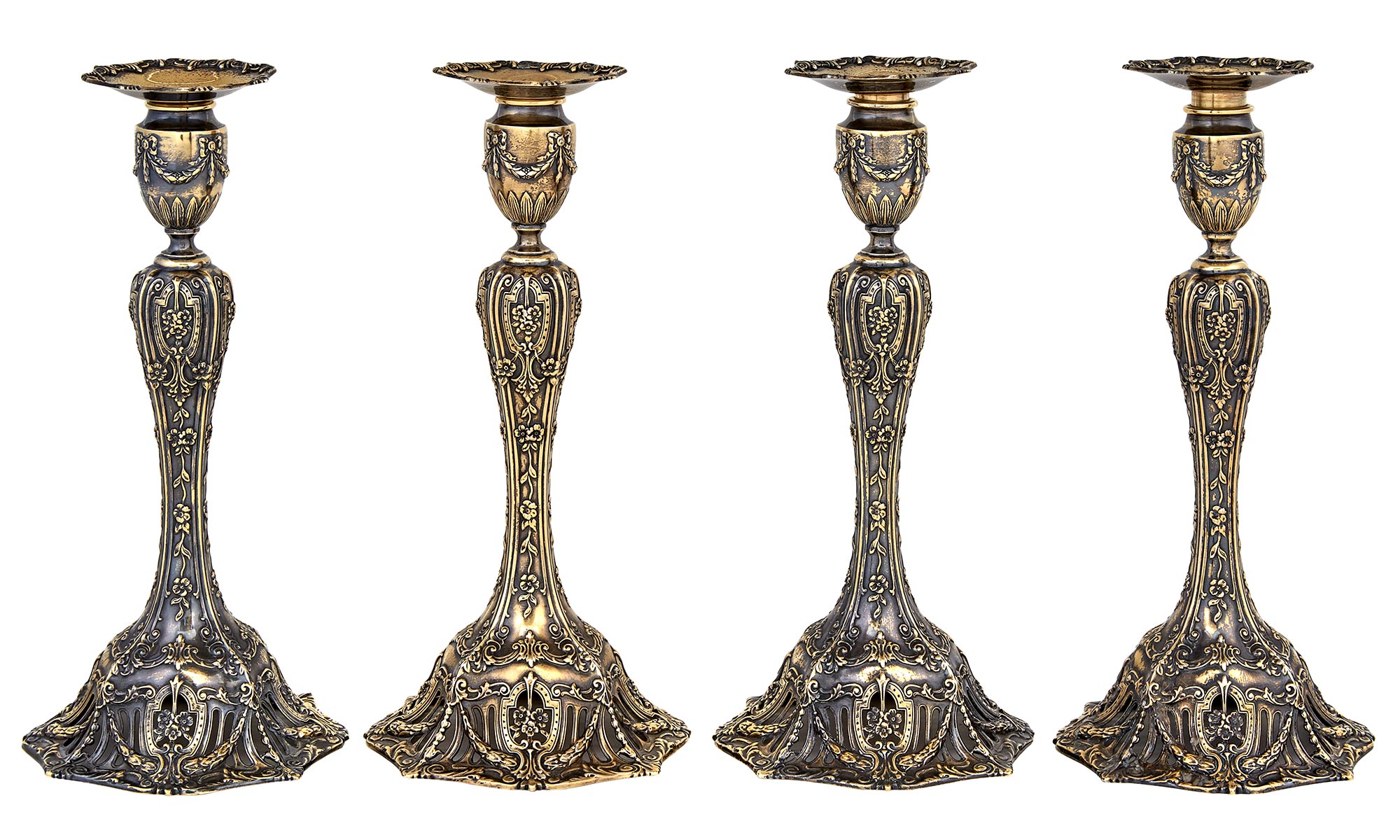 Lot image - Set of Four American Sterling Silver Gilt Candlesticks