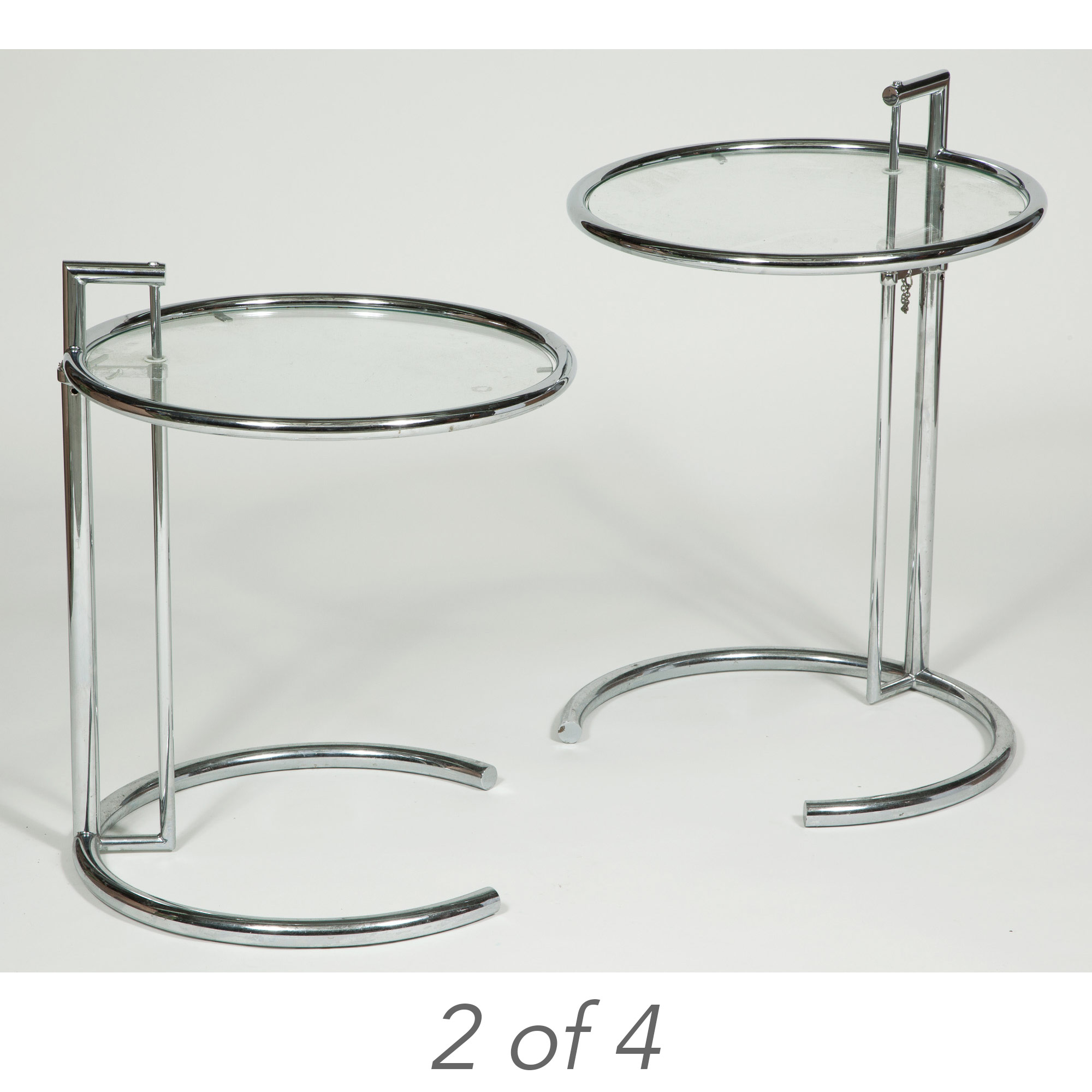 Lot image - Group of Four Chromed Metal and Glass E1027 Adjustable Tables