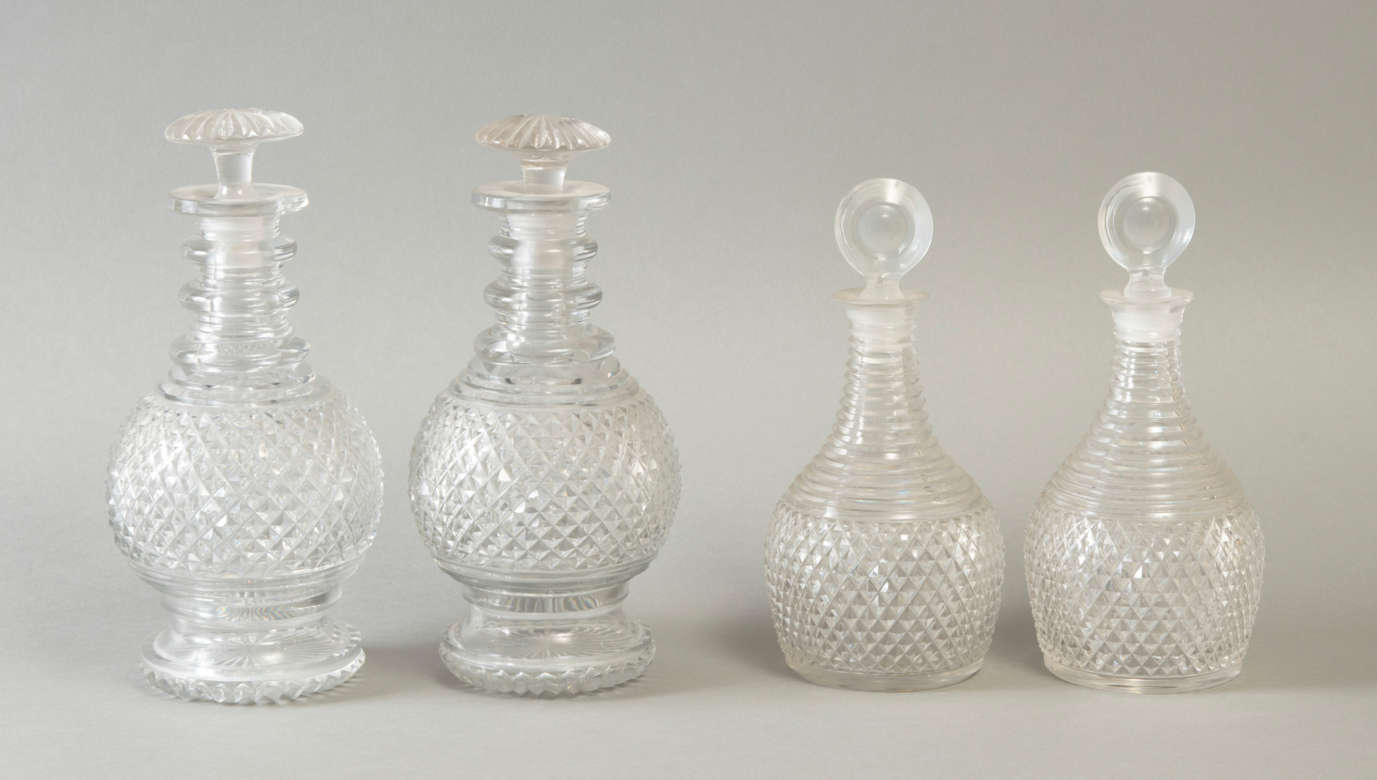 Lot image - Two Pairs of George III Style Colorless Cut Glass Decanters