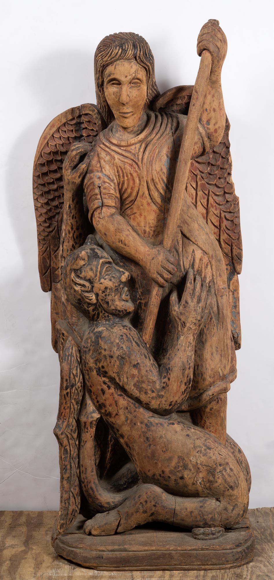Lot image - Carved Wood Figural Group of Saint Michael Vanquishing the Devil