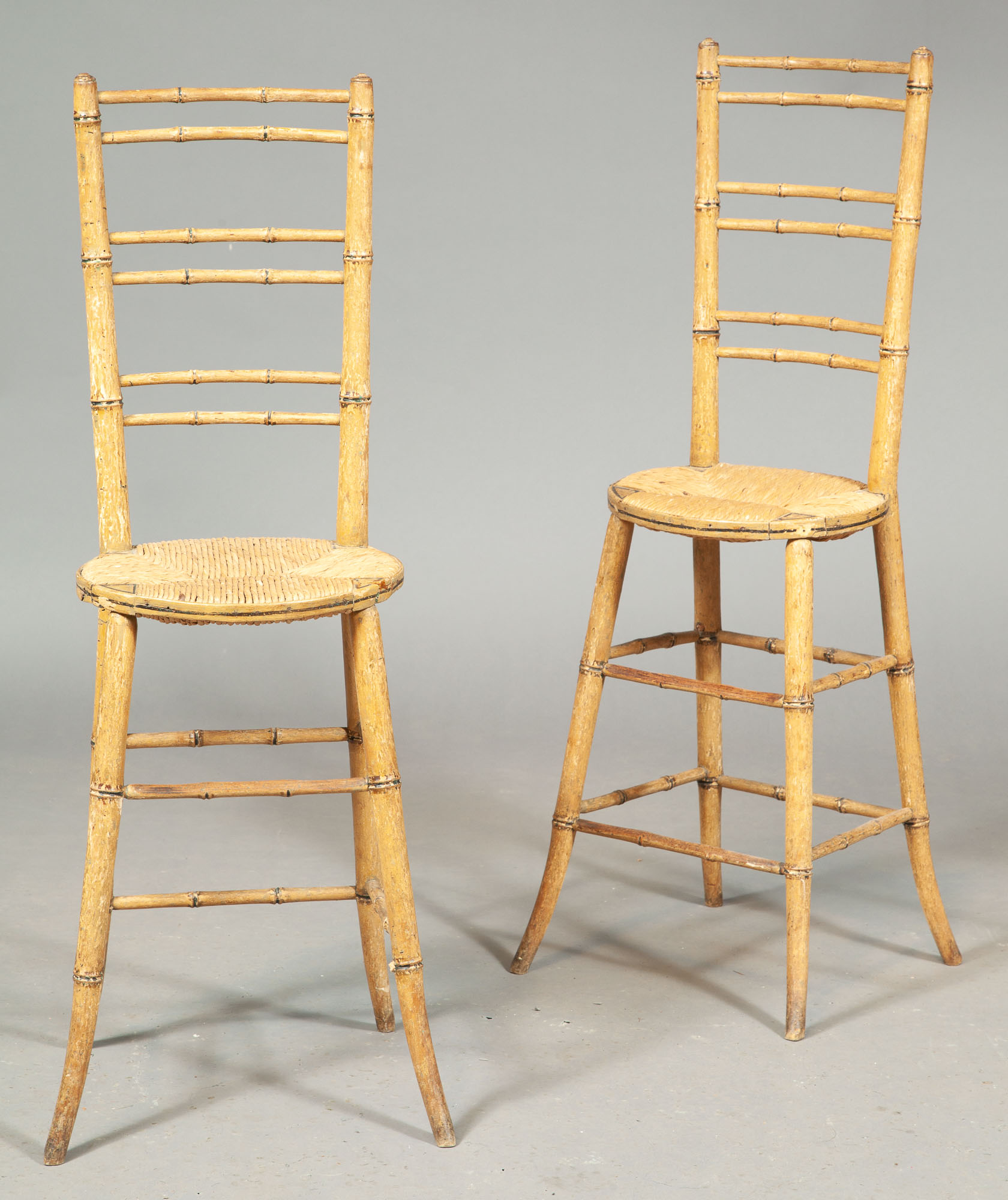 Lot image - Pair of Regency Faux Bamboo Painted High Back Rush Seat Side Chairs