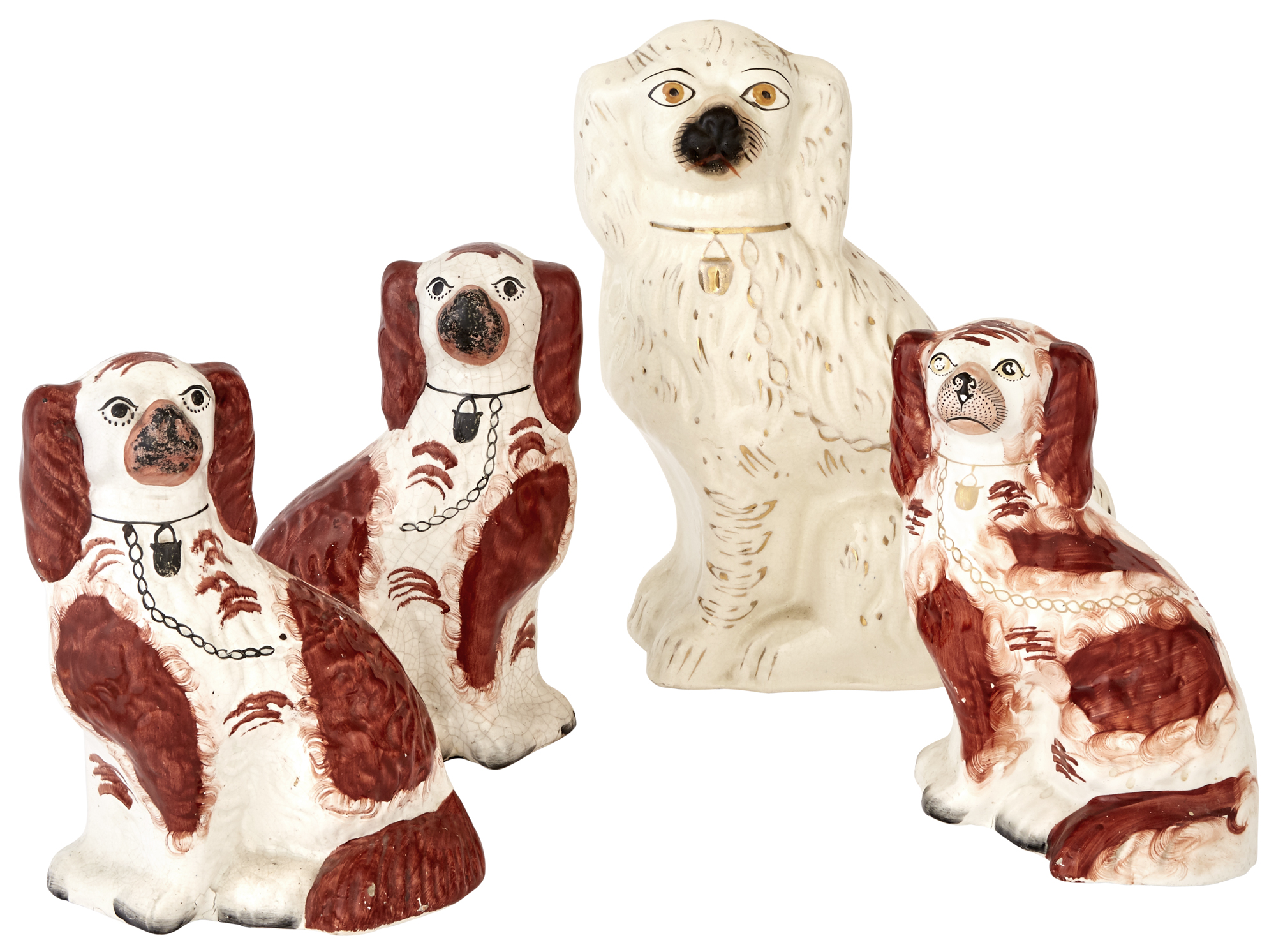 Lot image - Group of Four Staffordshire Pottery Figures of Seated Spaniels