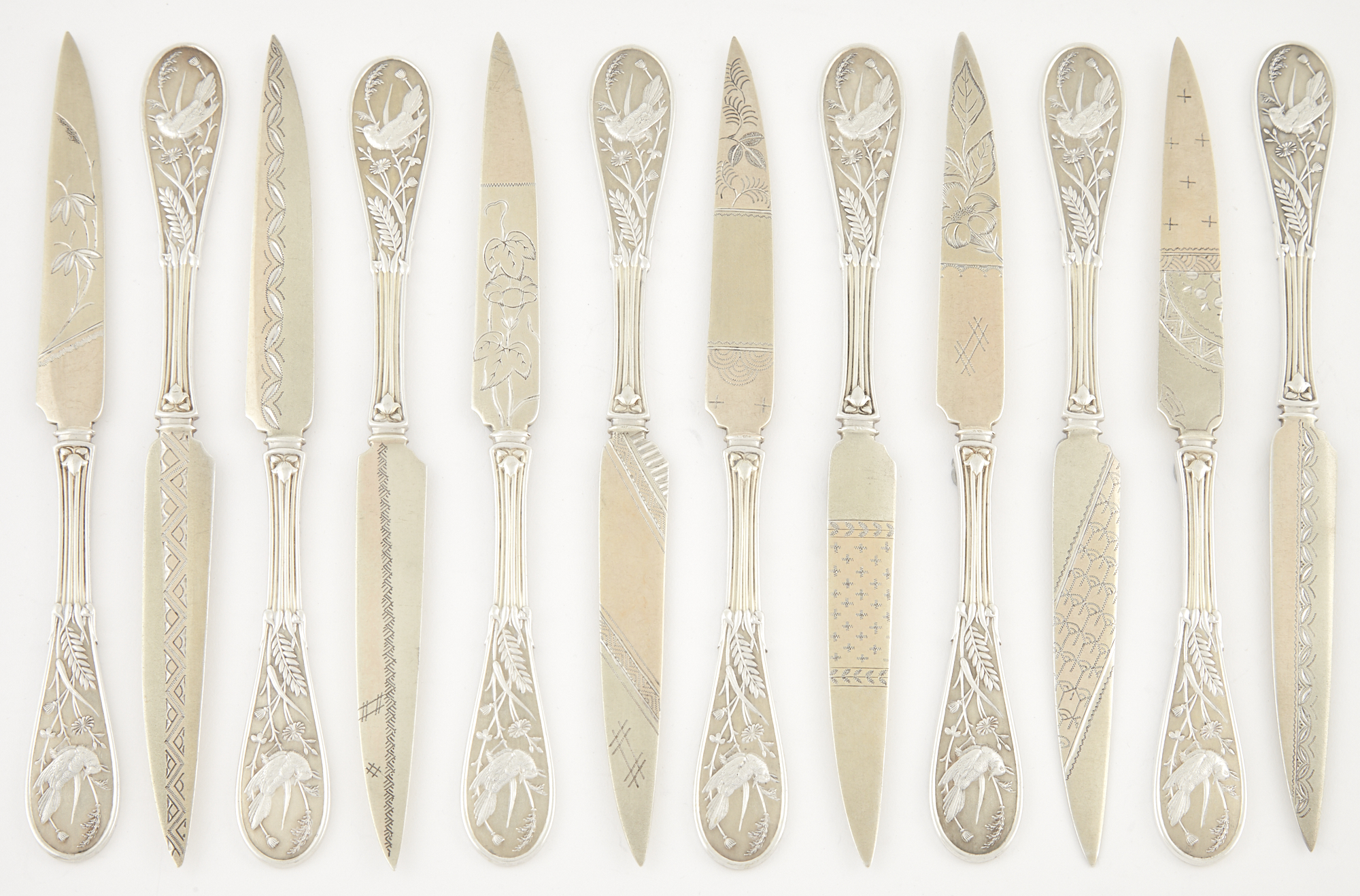 Lot image - Set of Twelve Tiffany & Co. Parcel Gilt Sterling Silver Japanese