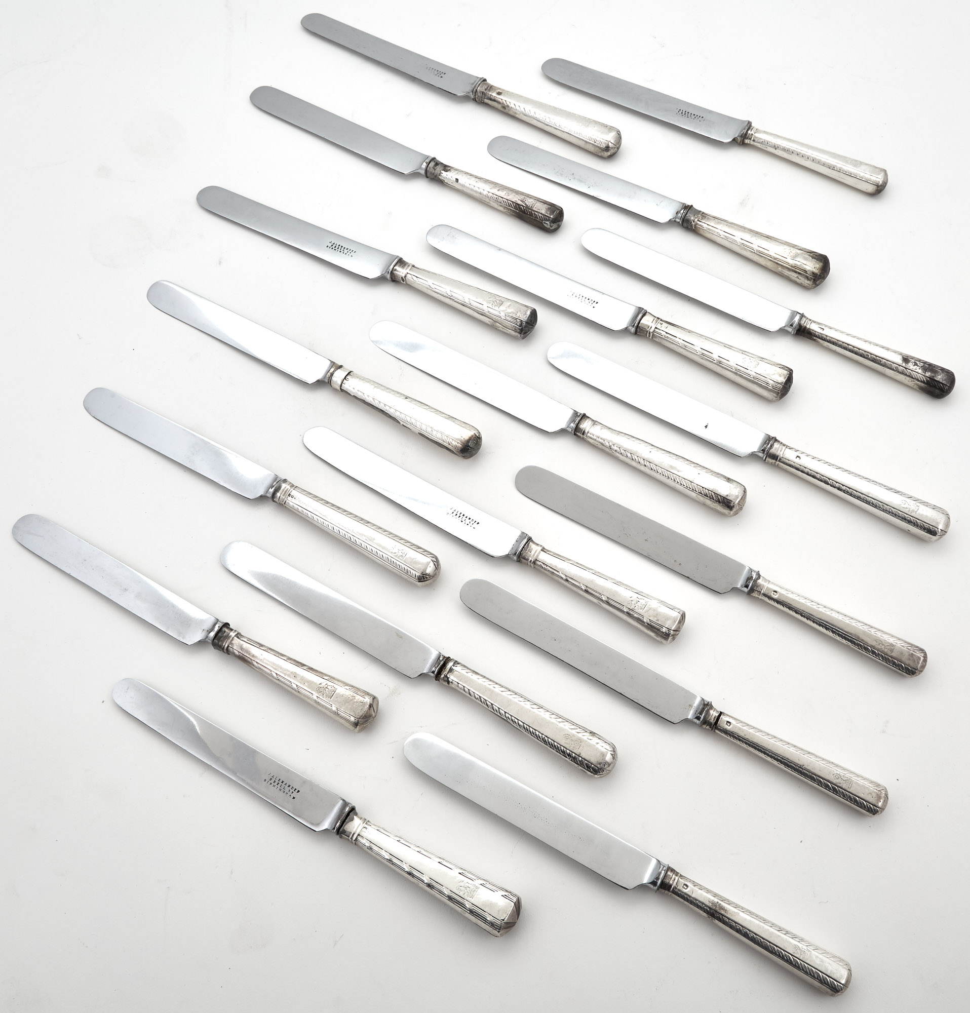Lot image - Miscellaneous Group of Eighteen Sterling Silver Dinner Knives