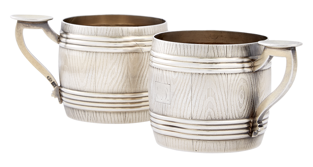 Lot image - Pair of Russian Silver-Gilt Trompe LOeil Tea Glass Holders