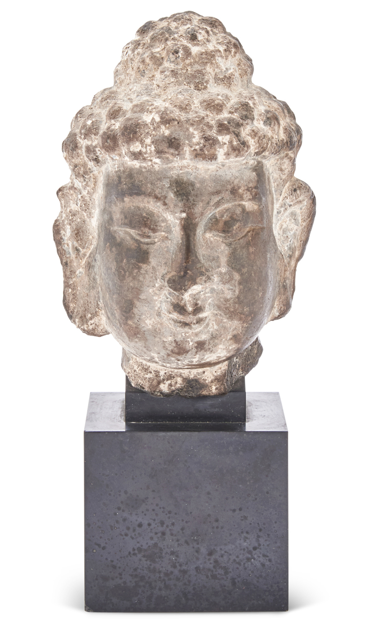 Lot image - A Chinese Carved Stone Head of Buddha