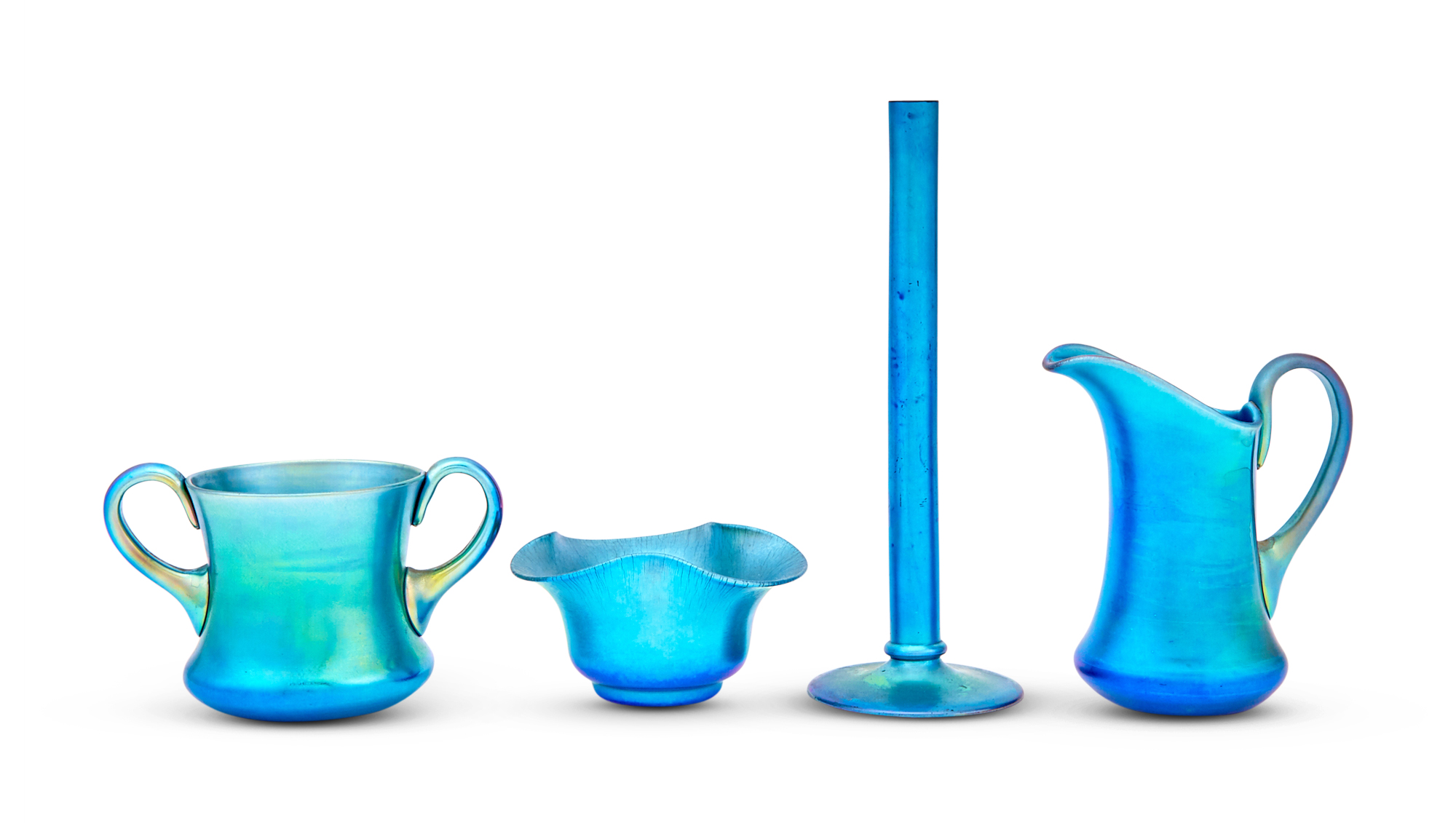 Lot image - Group of Four Carder Steuben Blue Aurene Glass Table Articles