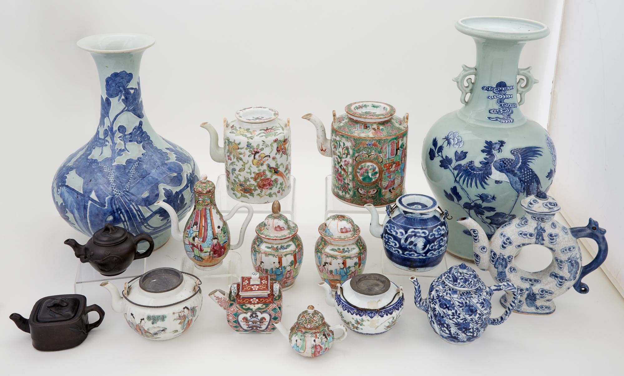 Lot image - Miscellaneous Group of Fourteen Chinese Porcelain and Pottery Teapots; Together with Two Chinese Porcelain Vases