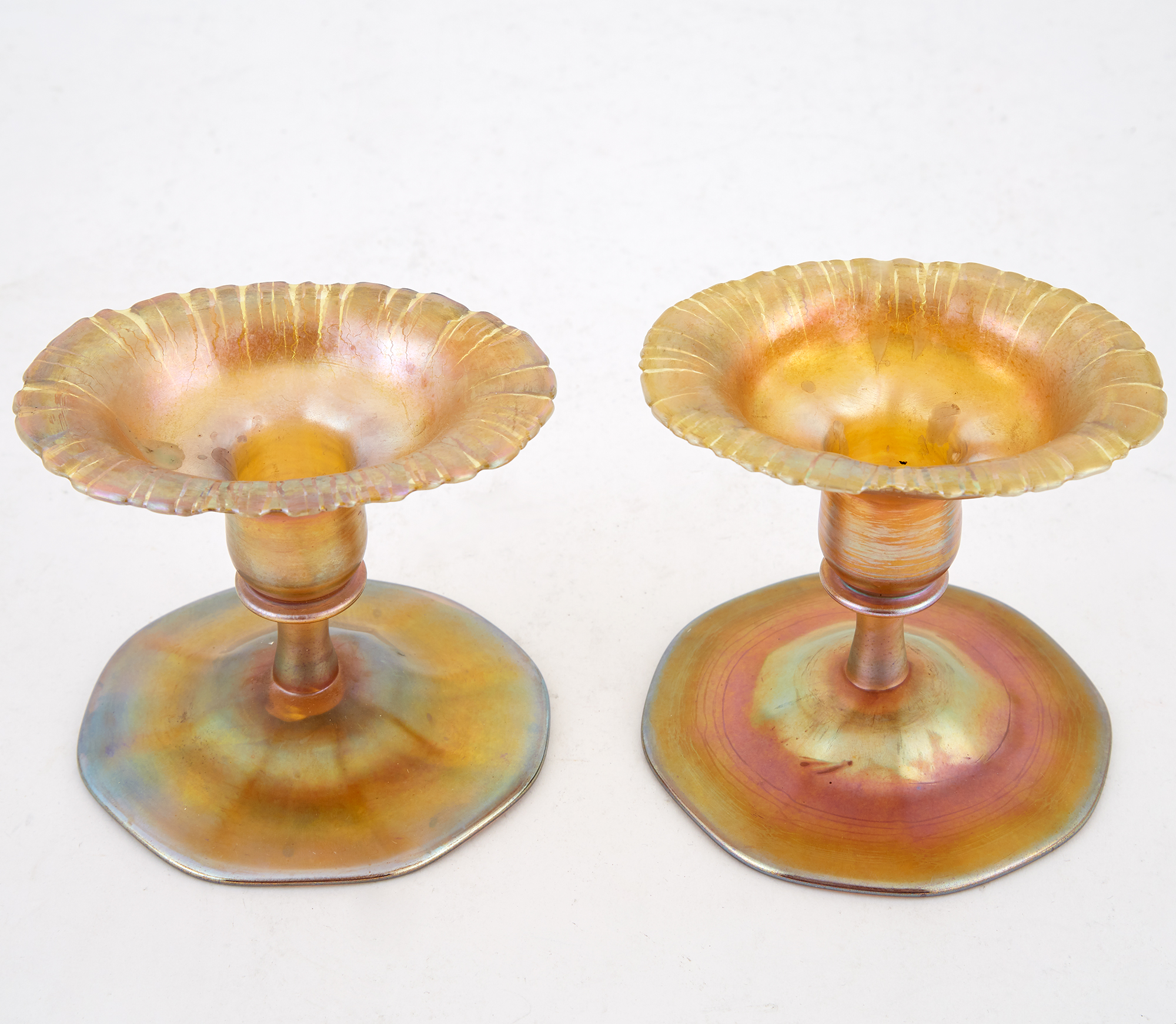 Lot image - Close Pair of Tiffany Favrile Glass Candlesticks
