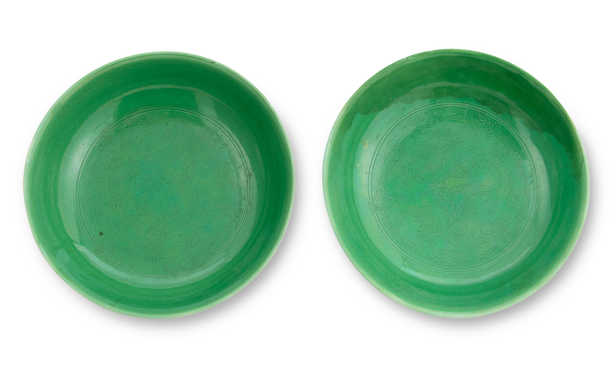 Lot image - A Pair of Chinese Incised Green Ground Porcelain Dragon Dishes