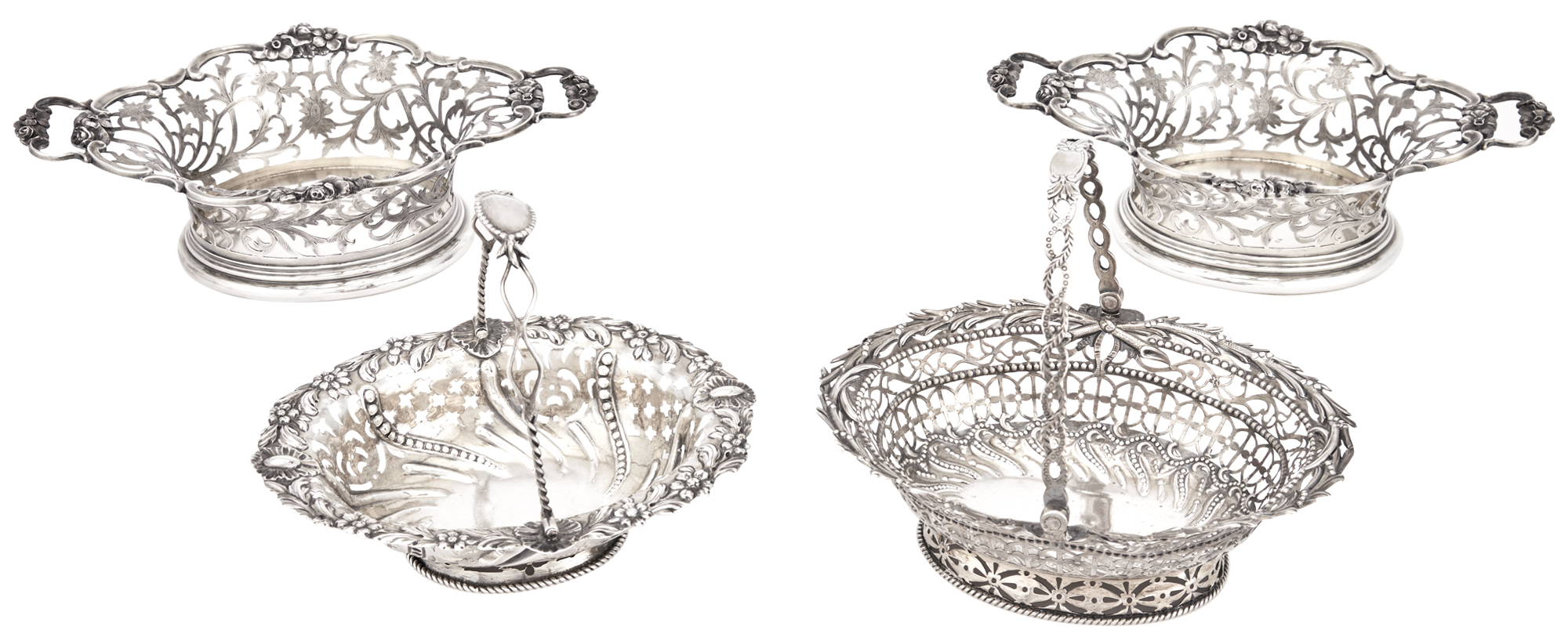 Lot image - Two George III Sterling Silver Sweetmeat Baskets and Two Victorian Sterling Silver Baskets