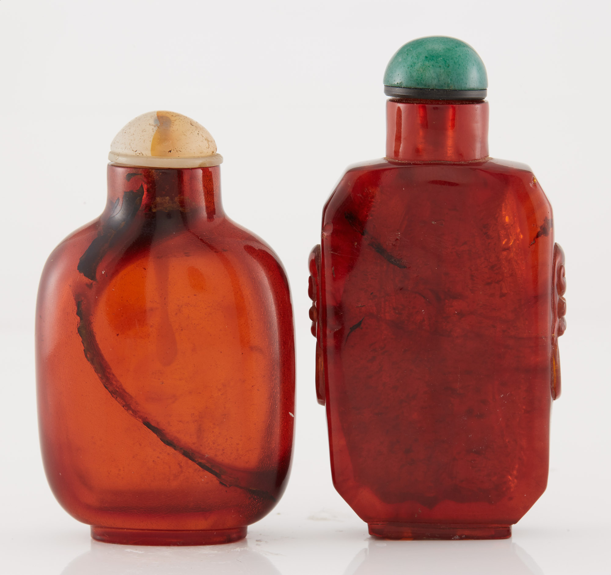 Lot image - Two Chinese Amber Snuff Bottles