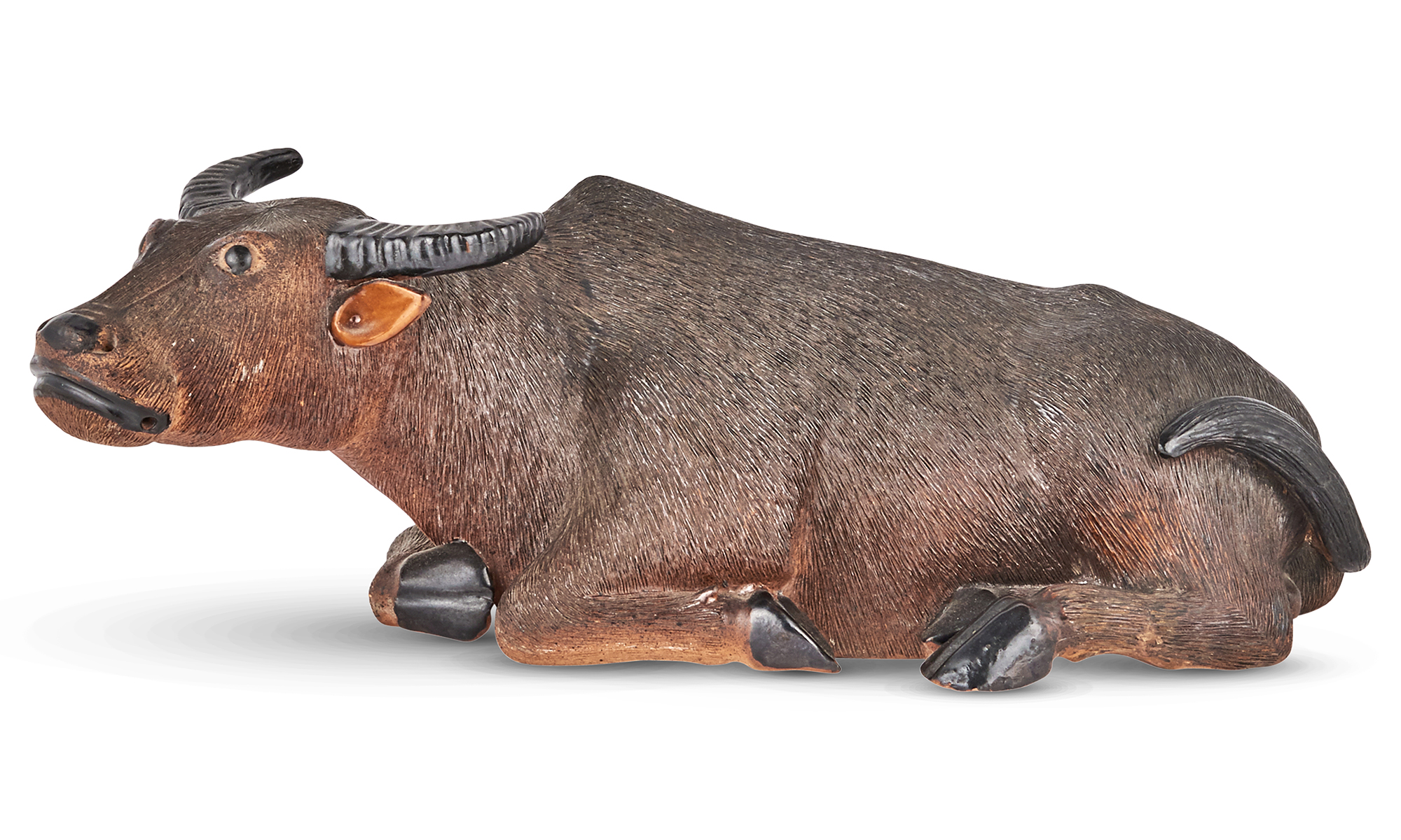 Lot image - A Chinese Painted Porcelain Model of a Buffalo