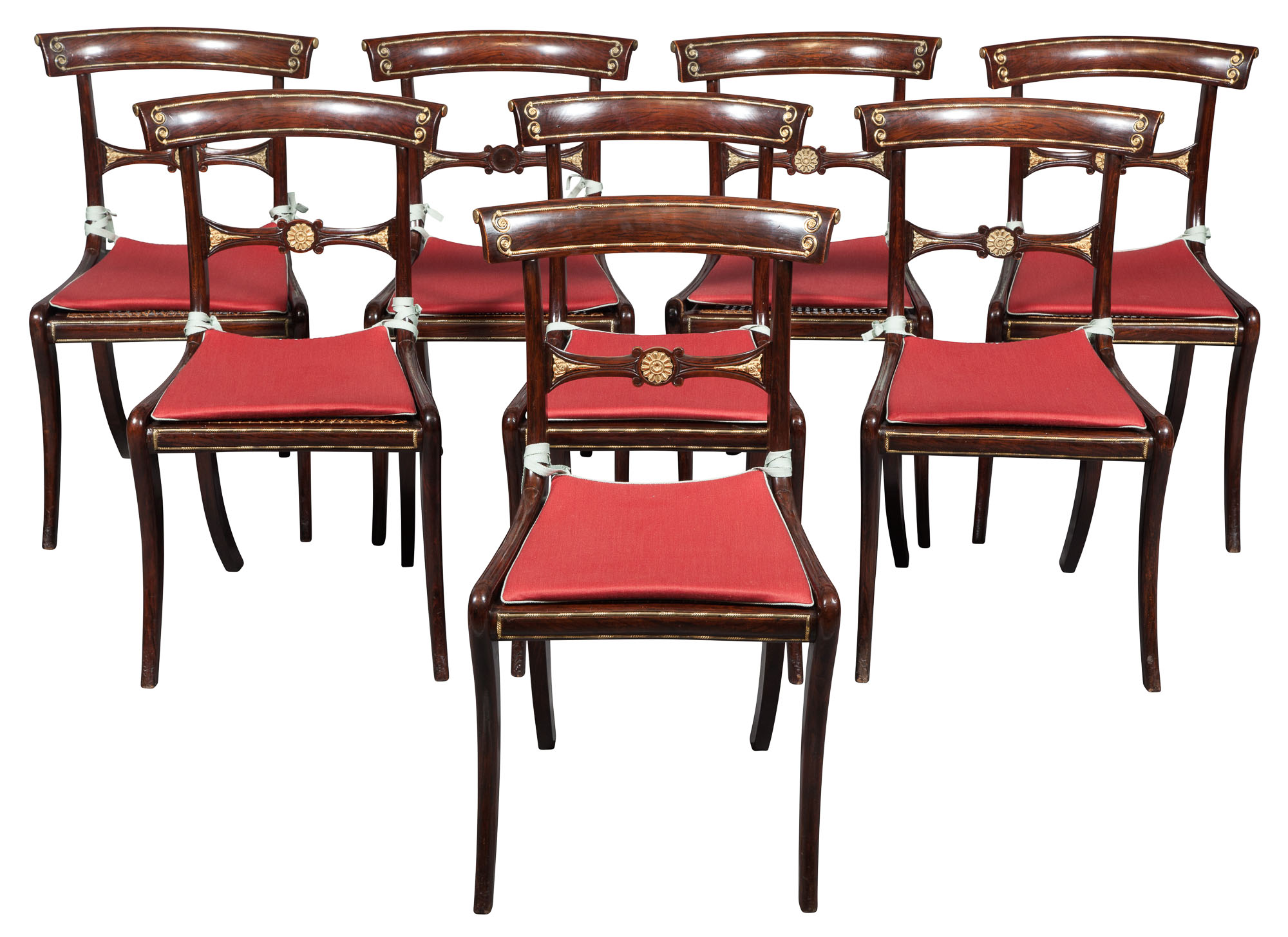 Lot image - Set of Eight Regency Brass-Mounted Rosewood-Grained Beechwood Caned Dining Chairs