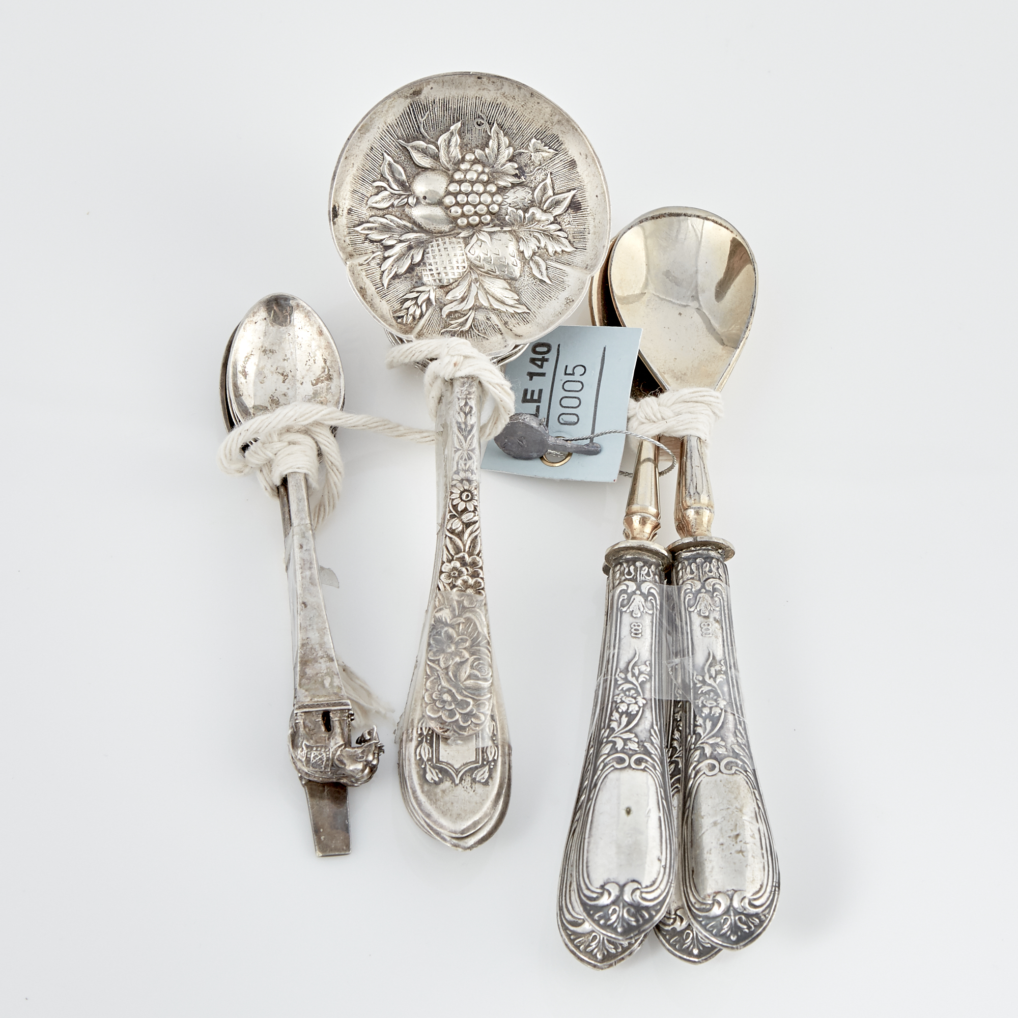 Lot image - 12 Pieces of Silverware, 7 ozs., 4 handles