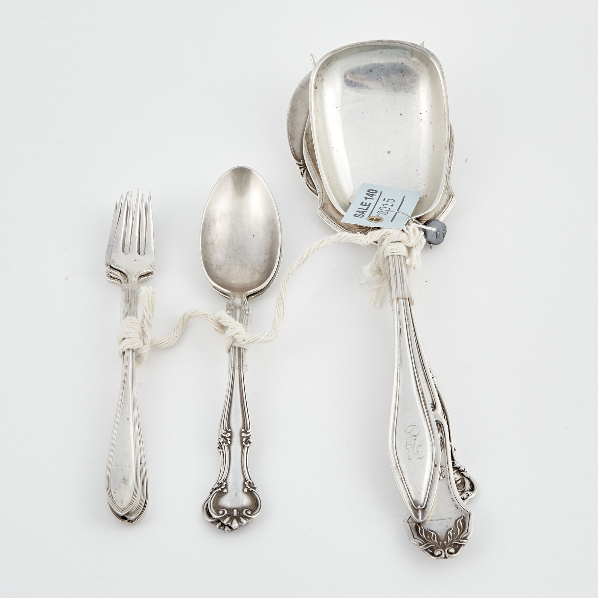 Lot image - 9 Pieces of Silverware, 10 ozs.