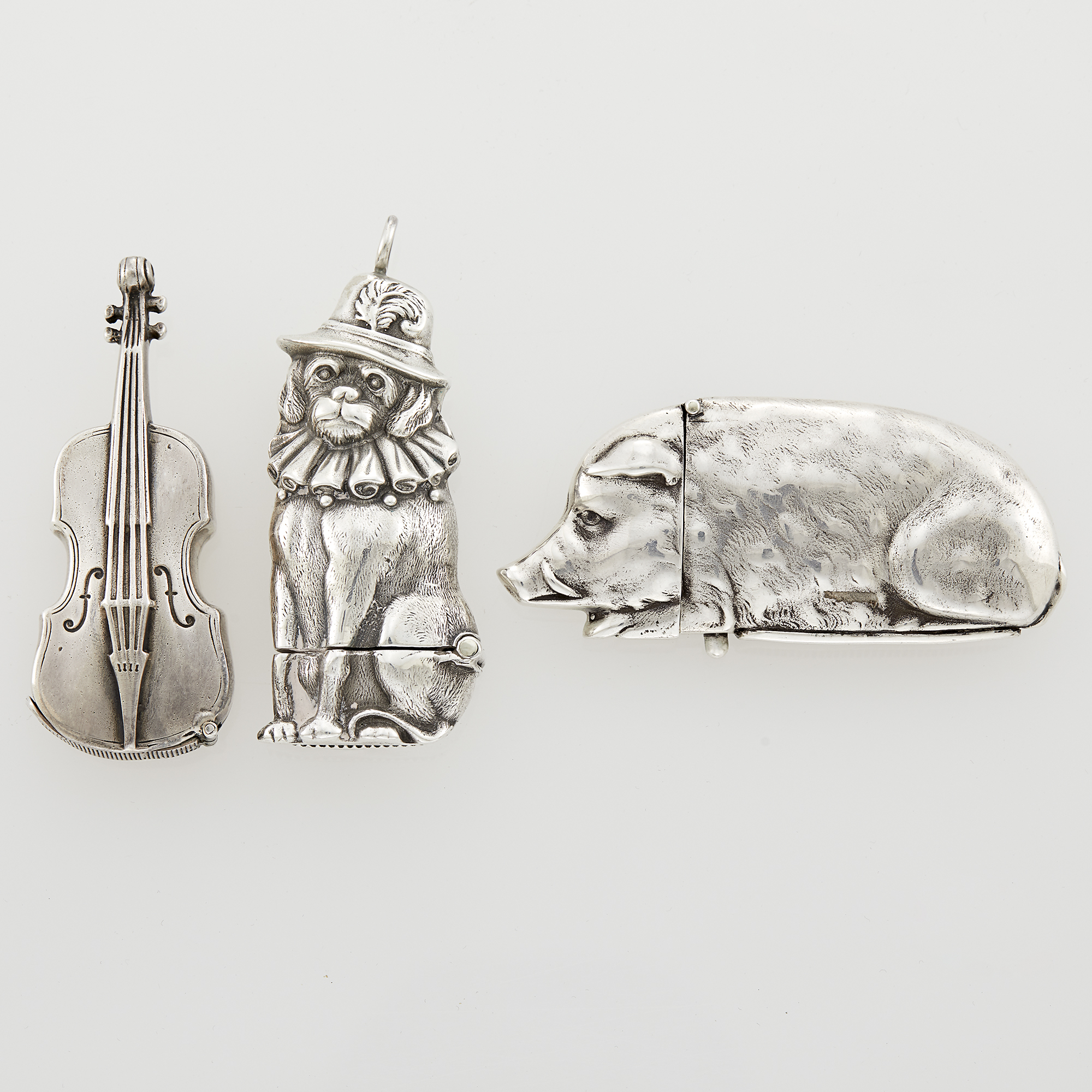 Lot image - Three Sterling Silver Novelty Vesta Cases