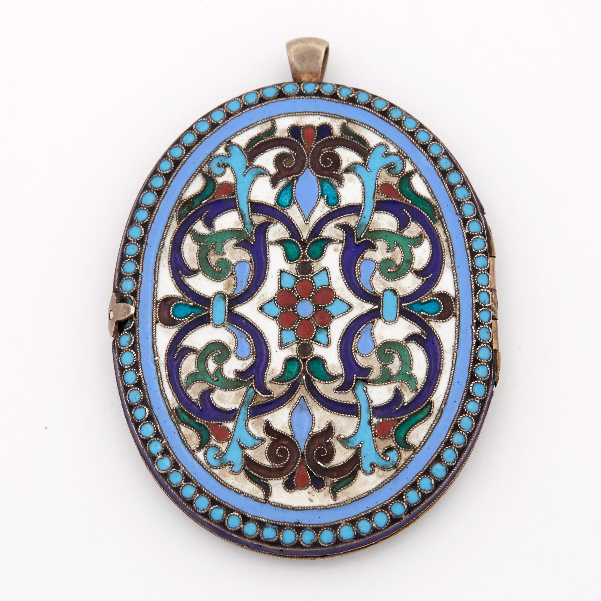 Lot image - Russian Parcel-Gilt Silver and Cloisonné Enamel Pendant Diptych Icon