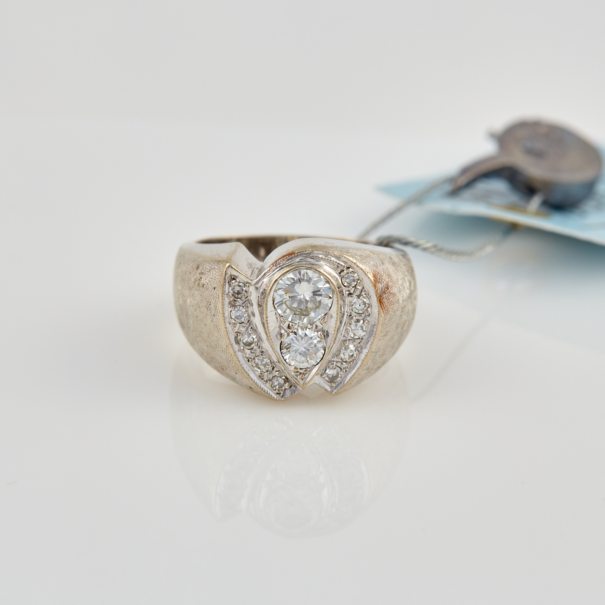 Lot image - Diamond Ring, 12 diamonds, center stone about 0.40 ct., 11 stones about 0.30 ct., 14K 7 dwt.