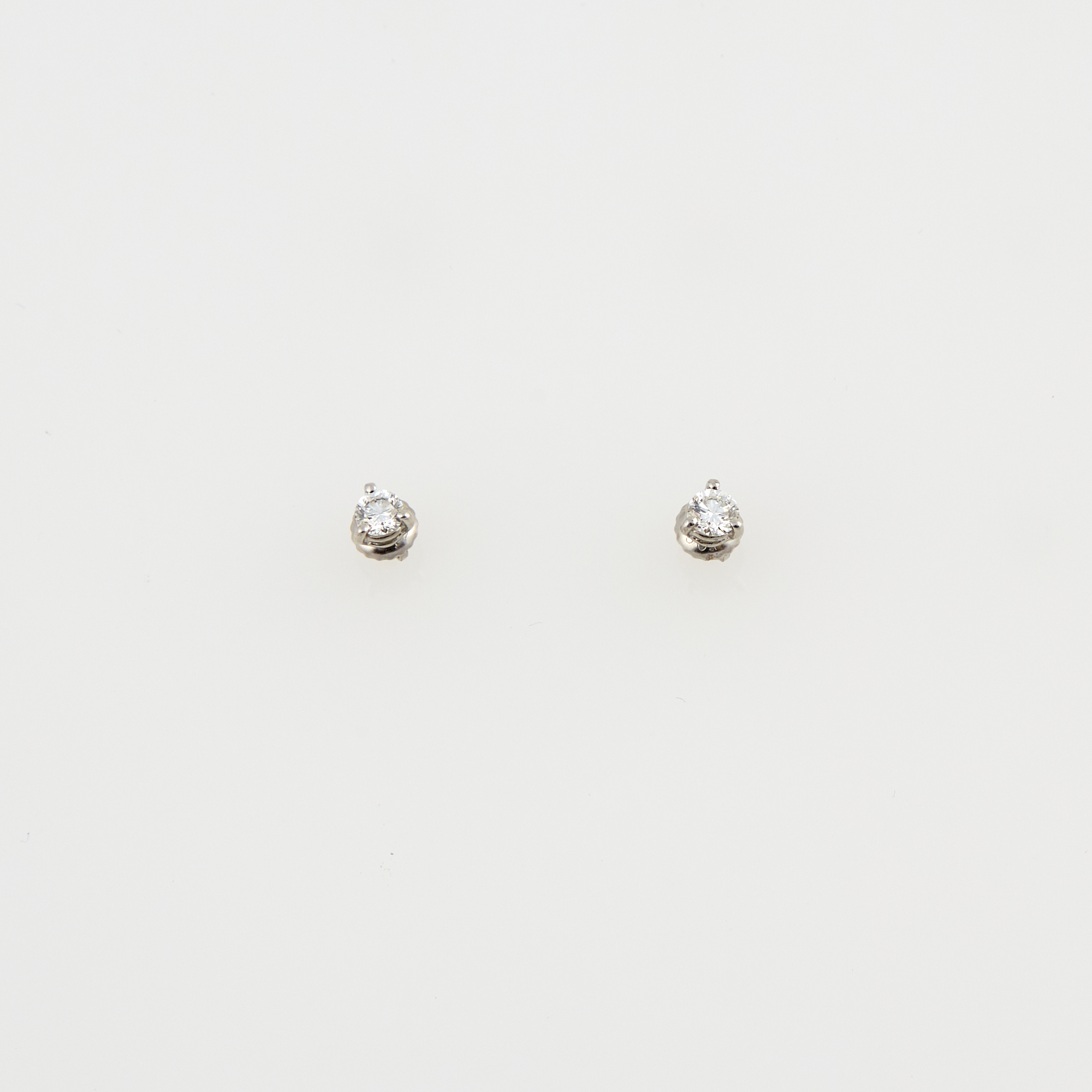 Lot image - Two Diamond Earscrews about 0.45 ct., Platinum 1 dwt.