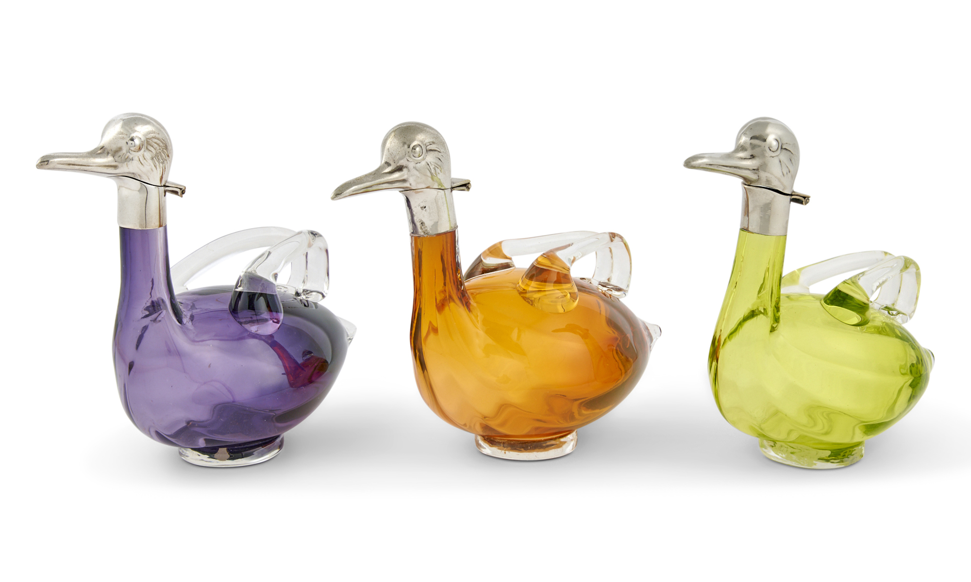 Lot image - Three Continental Novelty Silver Plate Mounted Colored Glass Bird Form Decanters