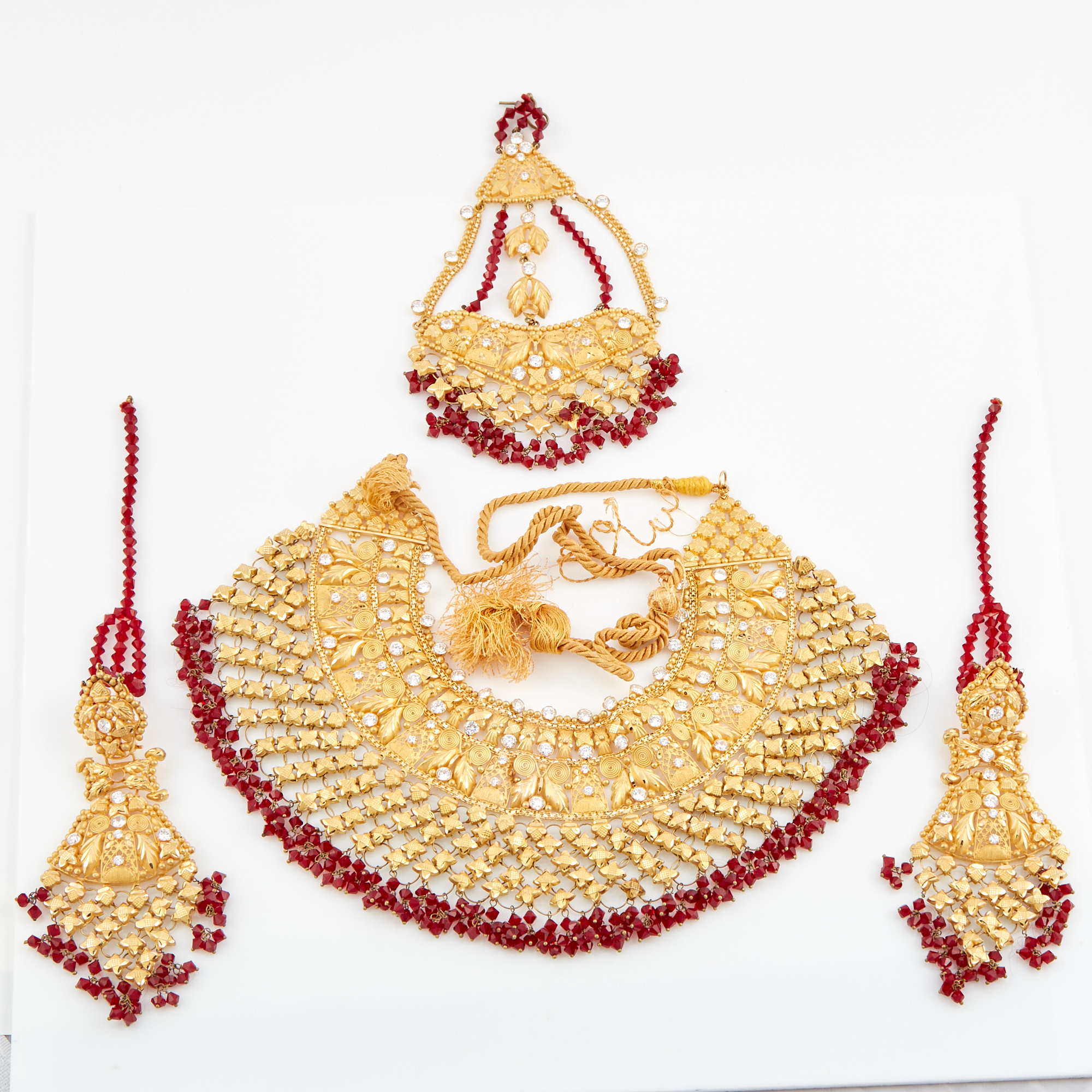 Lot image - Gold, Stone and Cord Necklace, Hair Piece and Two Earrings, 22K 118 dwt. all, stones missing and    damaged