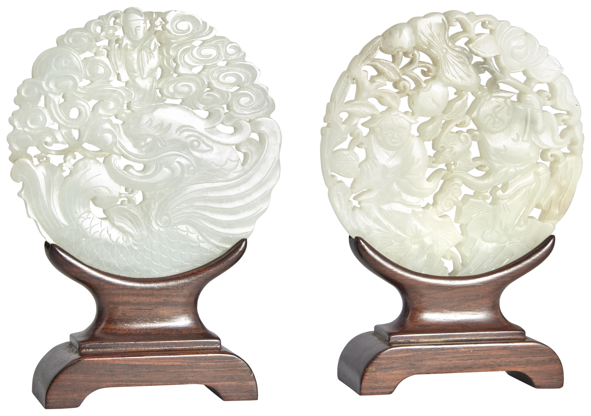 Lot image - A Pair of Chinese White Jade Reticulated Round Plaques