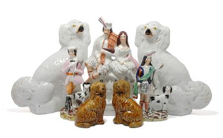 Lot image - Group of Seven Staffordshire and Other Pottery Figures and Dogs