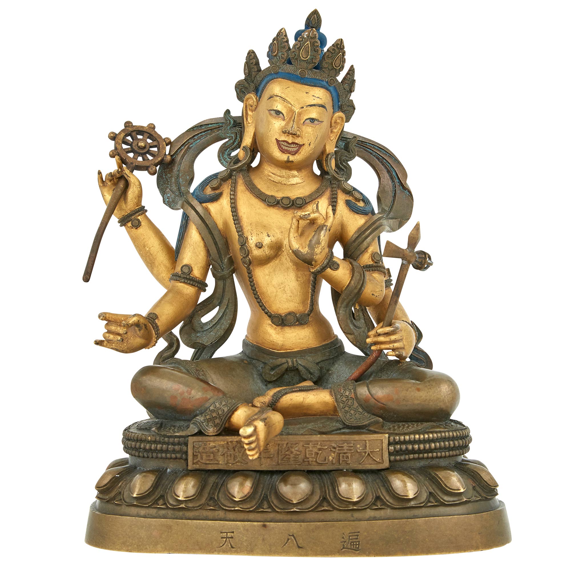 Lot image - Tibetan Parcel-Gilt Figure of a Seated Deity
