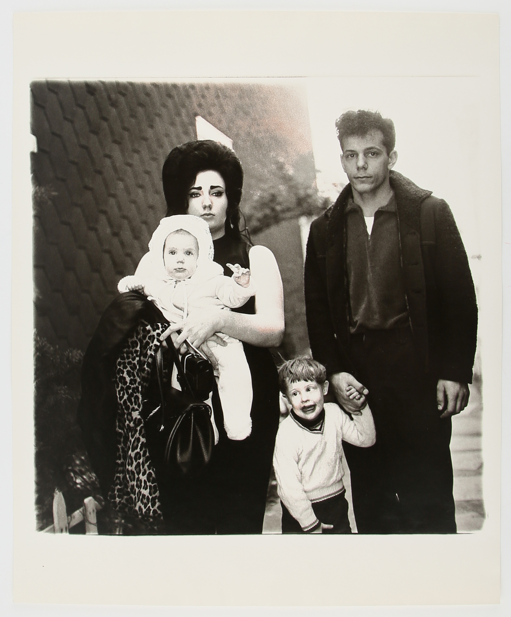 Lot image - ARBUS, DIANE (1923-1971)  A young Brooklyn family going for a Sunday outing, N.Y.C.,