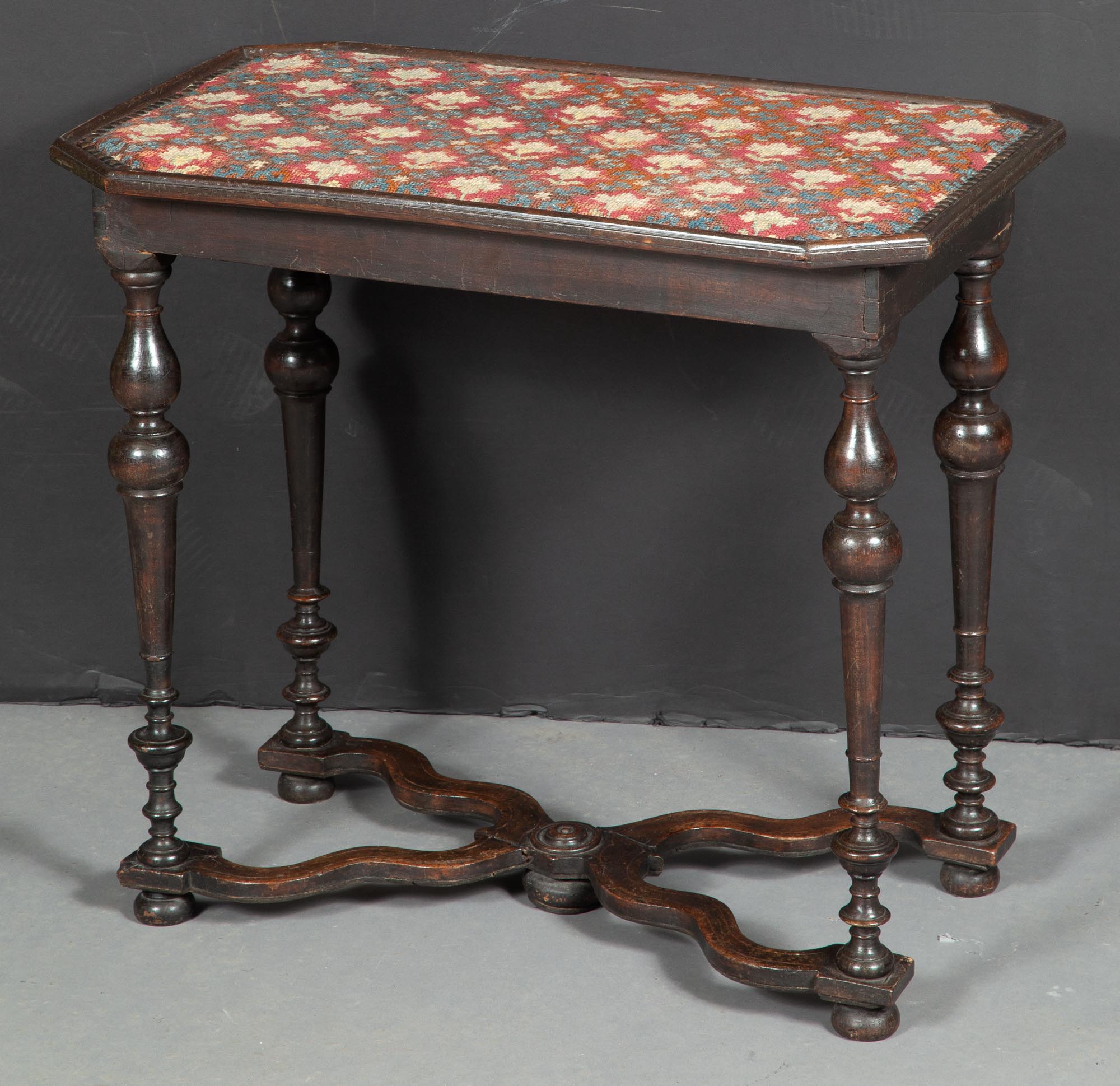 Lot image - Louis XIV Ebonized Beechwood and Needlework-Lined Occasional Table